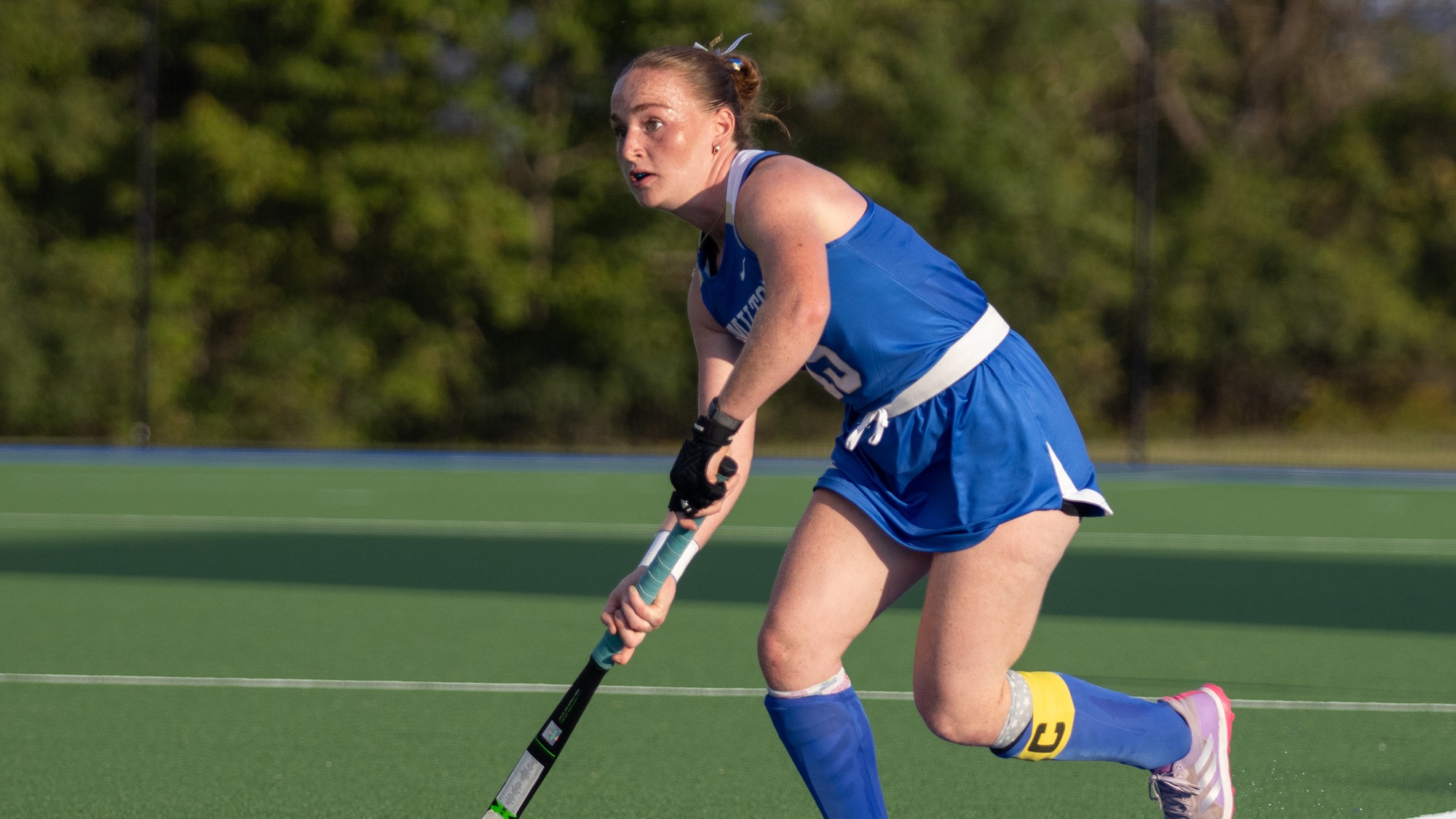 Isabelle Nahon looks for a field hockey teammate to pass to against RPI