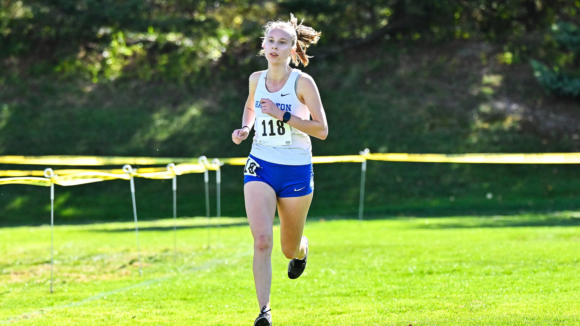 Emma Chrismer sprints to the finish line in the Hamilton Cross Country Invitational