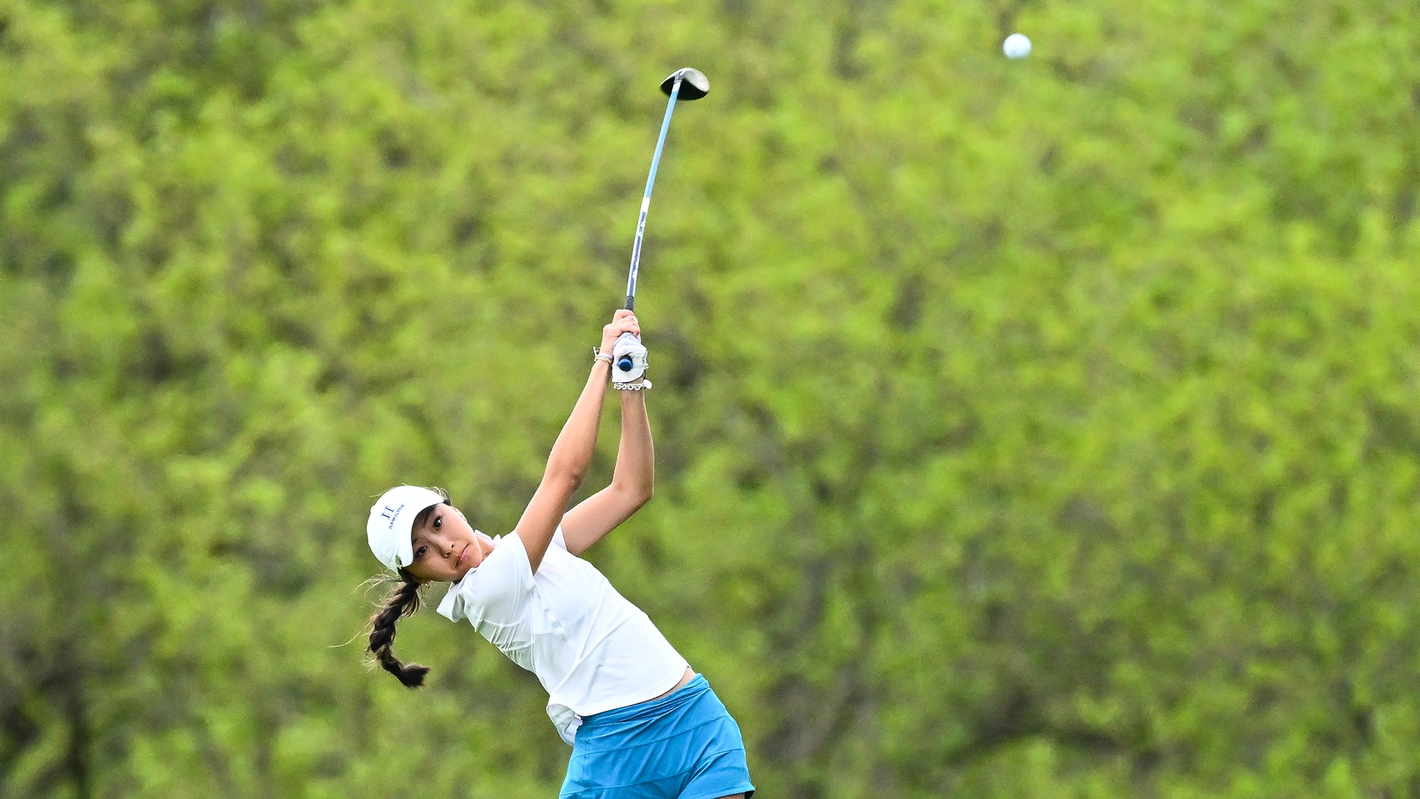Aubrey Lee hits a fairway metal during the 2025 NESCAC Women's Golf Championship at Yahnundasis Golf Club
