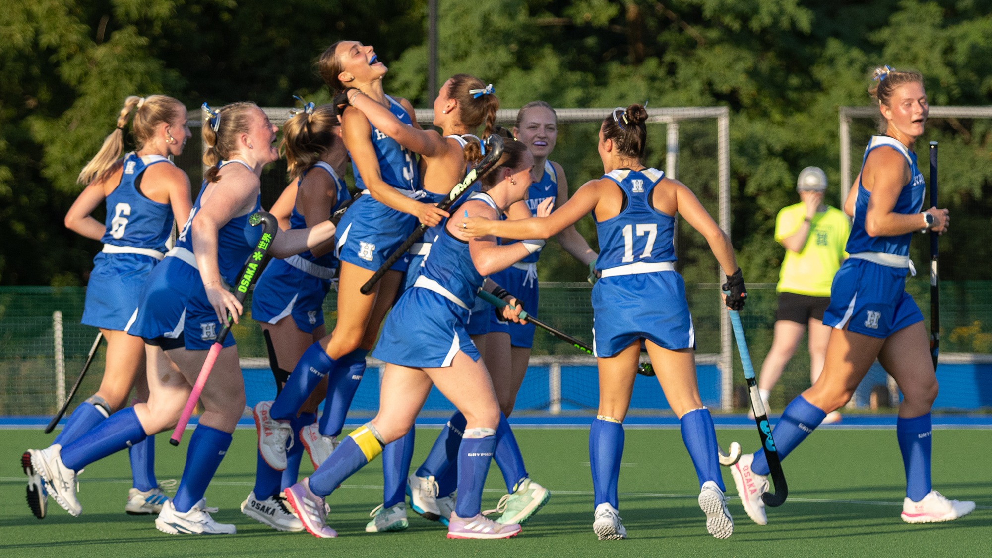 Field Hockey team celebrates their first goal against RPI