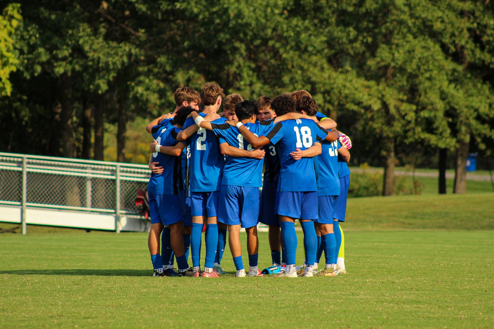 Mens Soccer Team Huddle