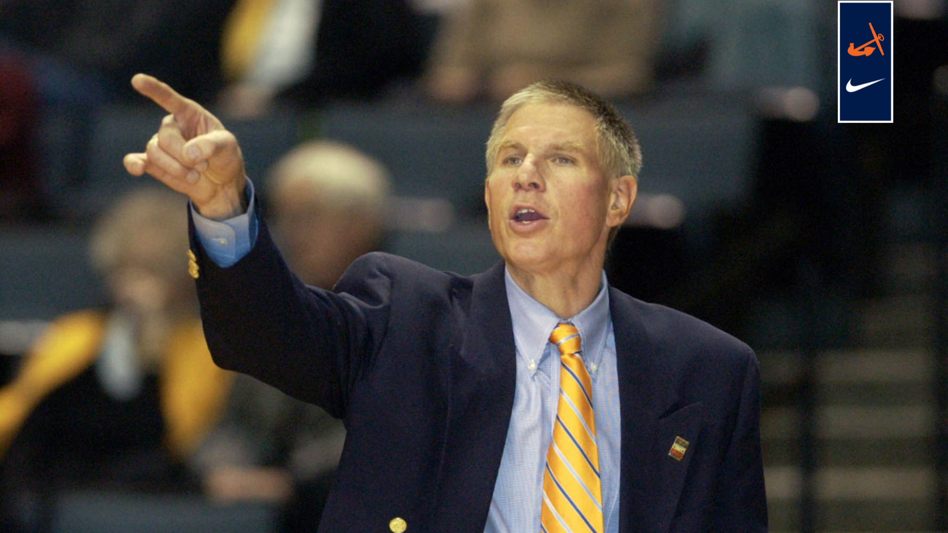 Glenn Van Wieren coaches on the sidelines.