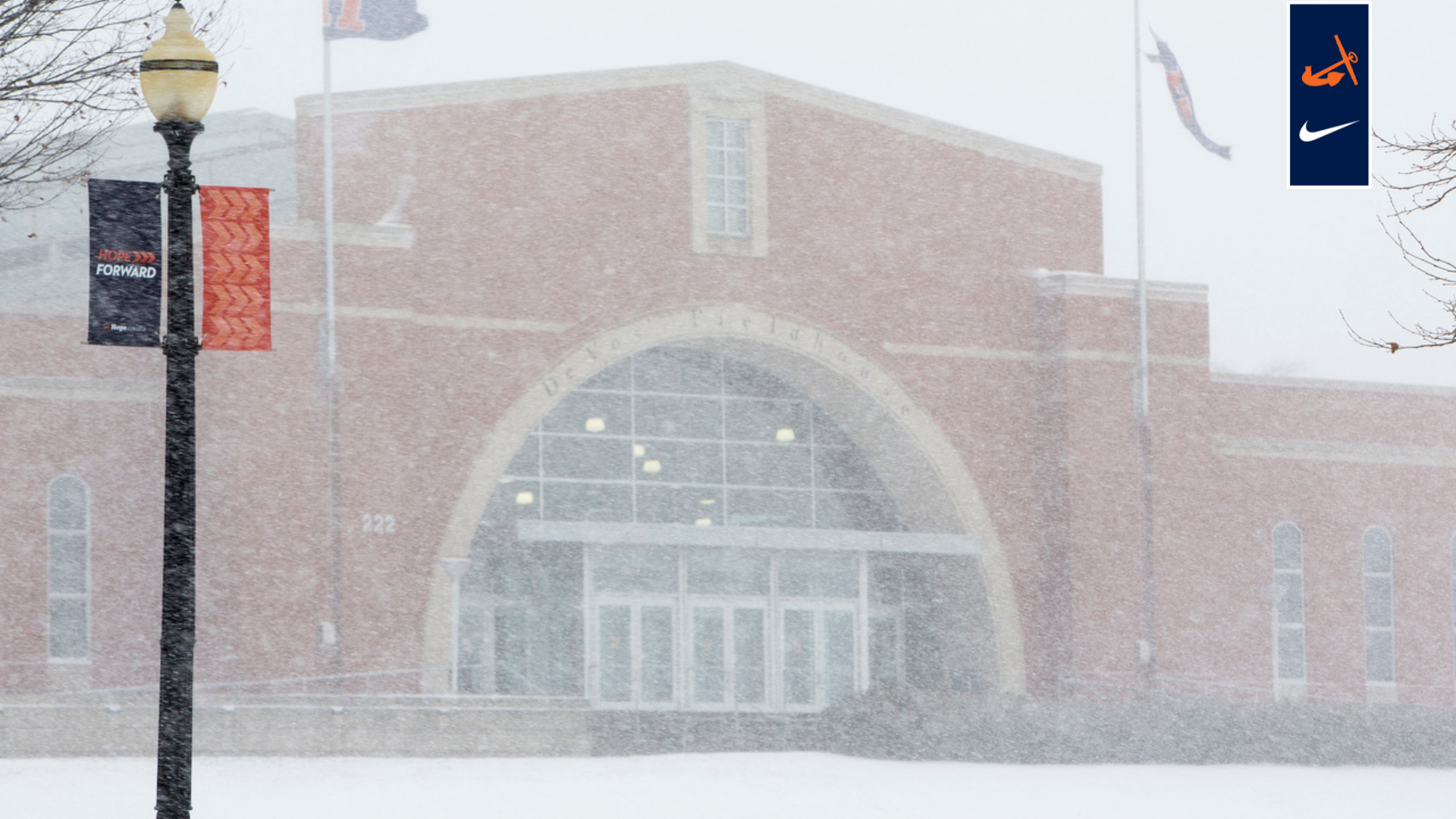 DeVos Fieldhouse on a snowy afternoon.