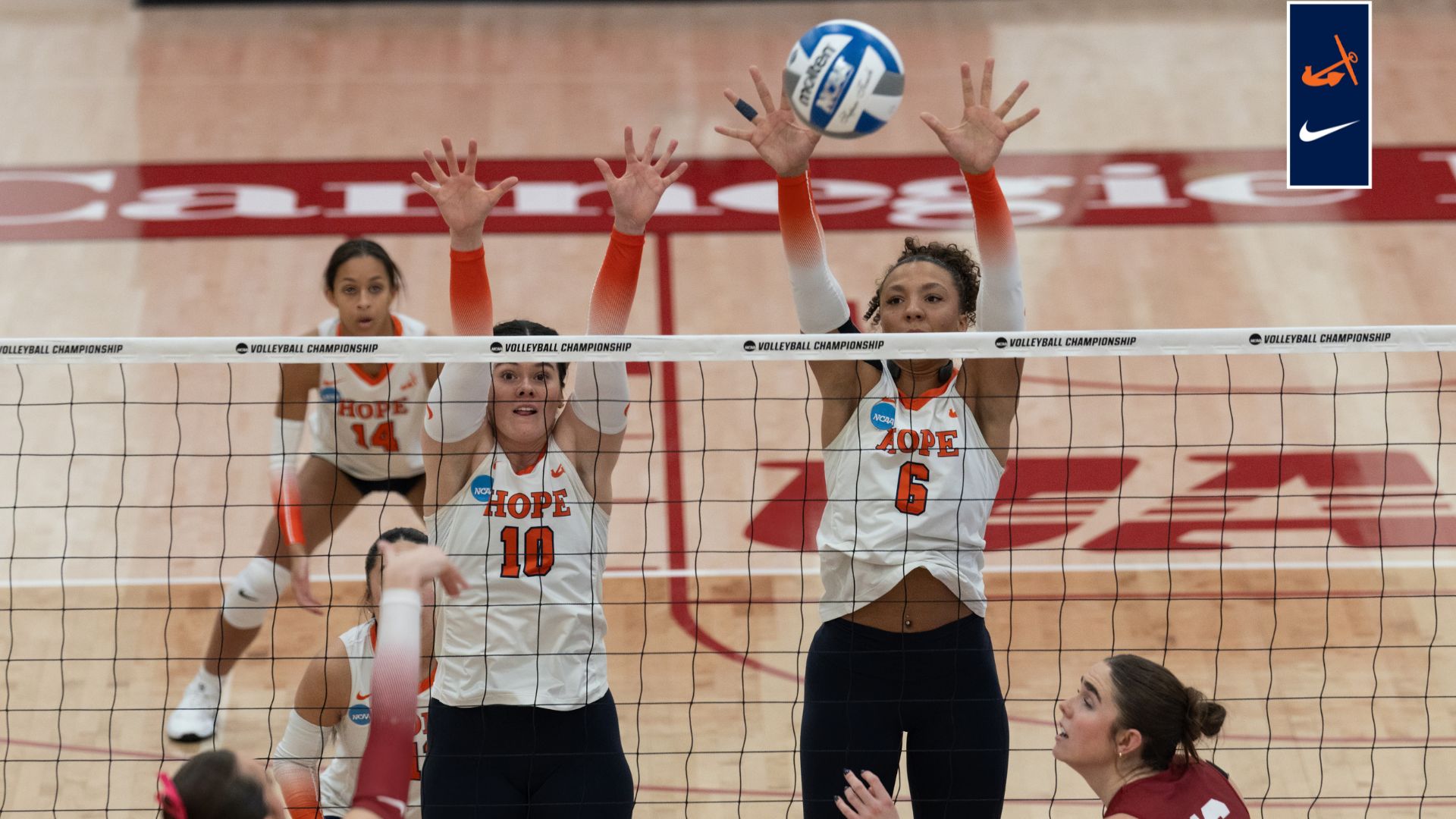Ella Contant and Kamryn Burbridge go for a block.