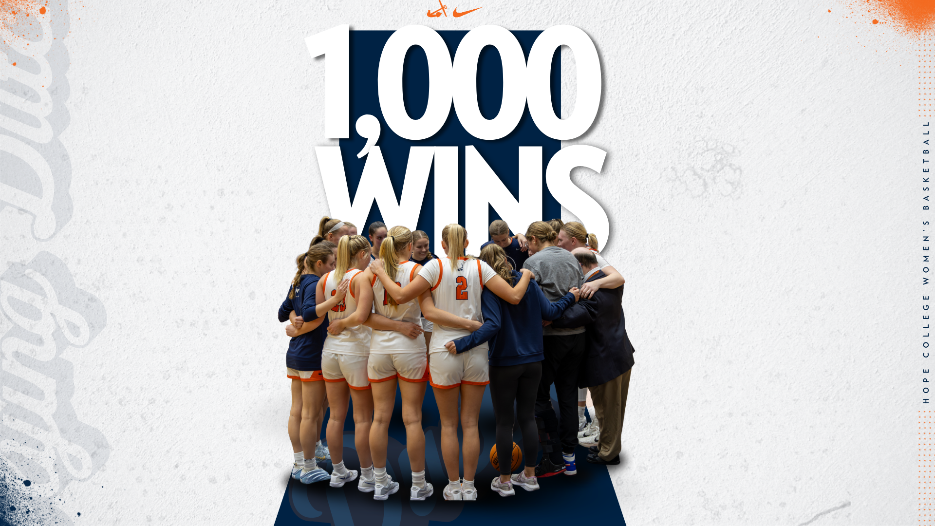 The Hope College women's basketball team huddles on the court.