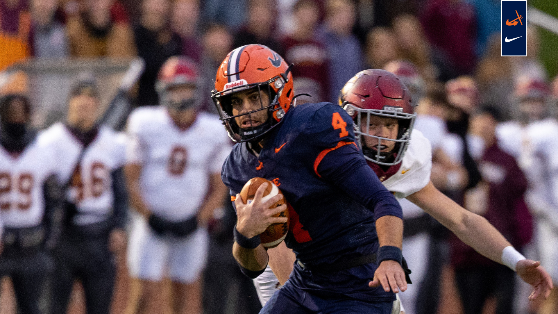 Quarterback Alex Thole runs fo ra gain.