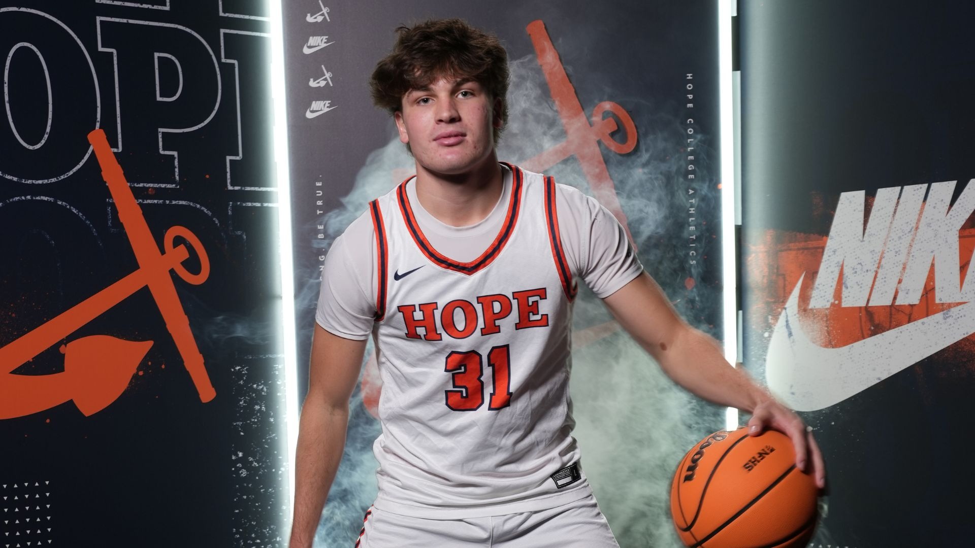 Brendan Cargill dribbles a basketball.