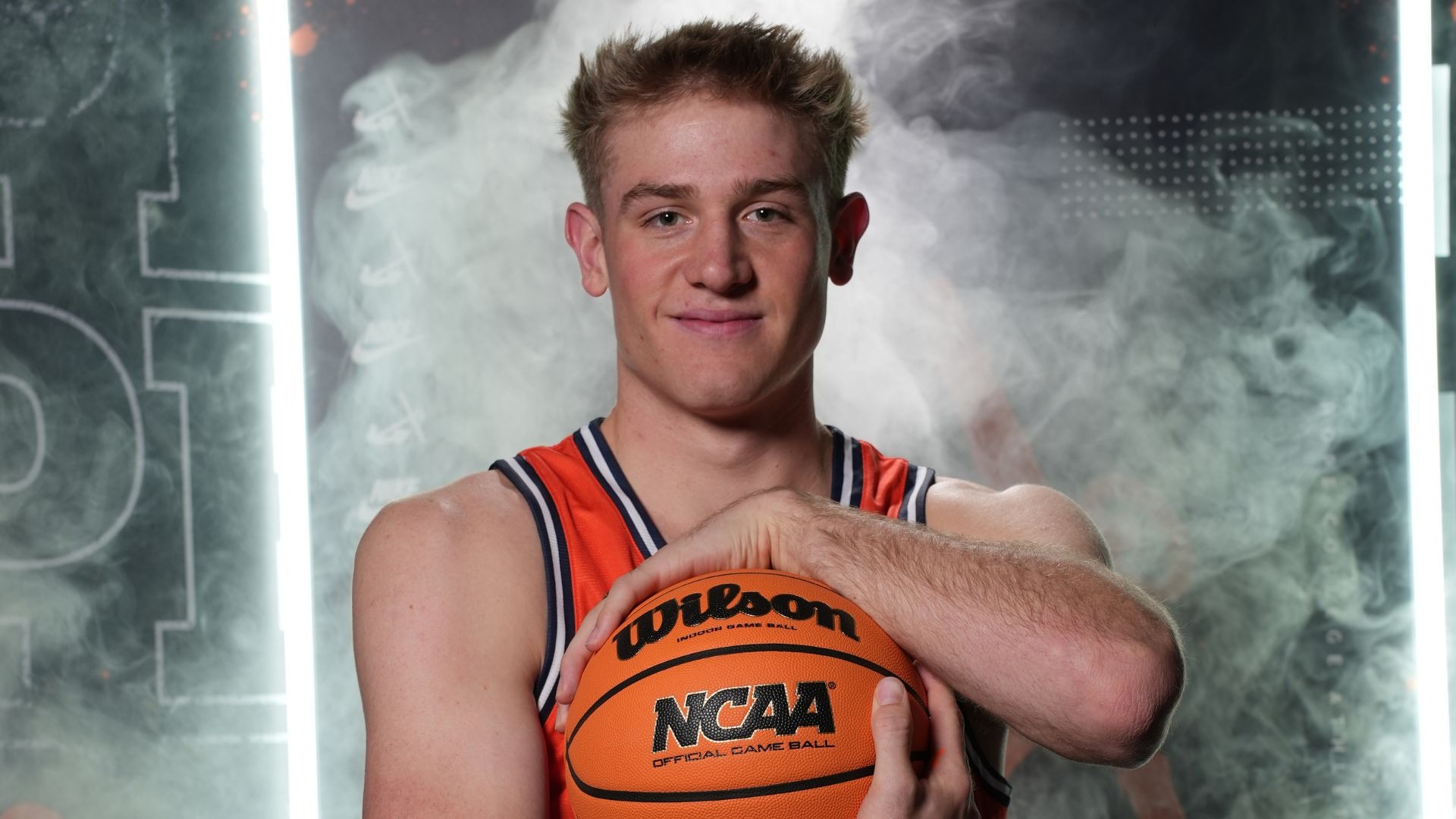 Parkey Hovey cradles a basketball.