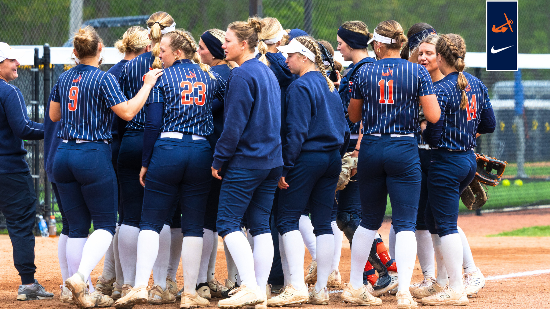 The Hope College softball team huddles up