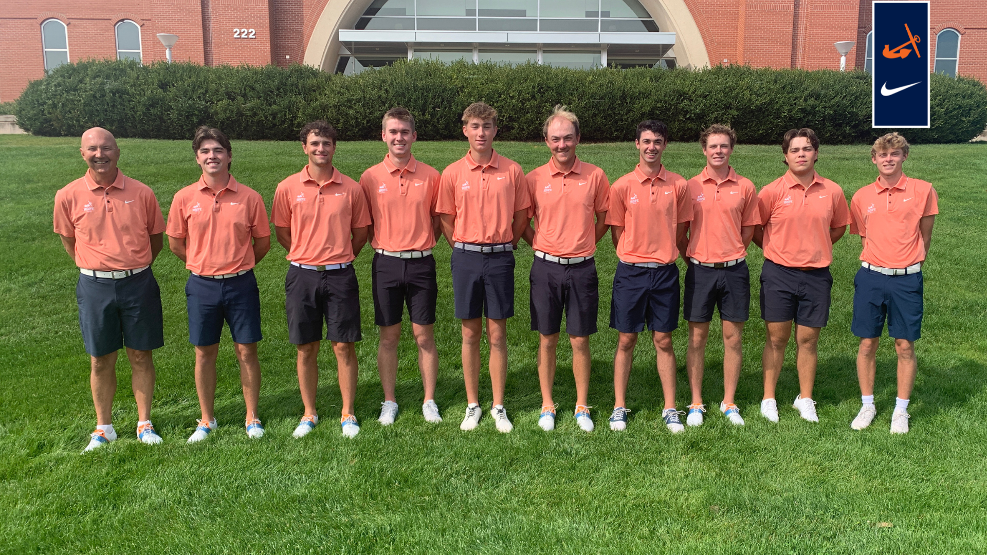 The Hope College men's golf team poses for a portrait in the lawn outside of DeVos Fieldhouse.