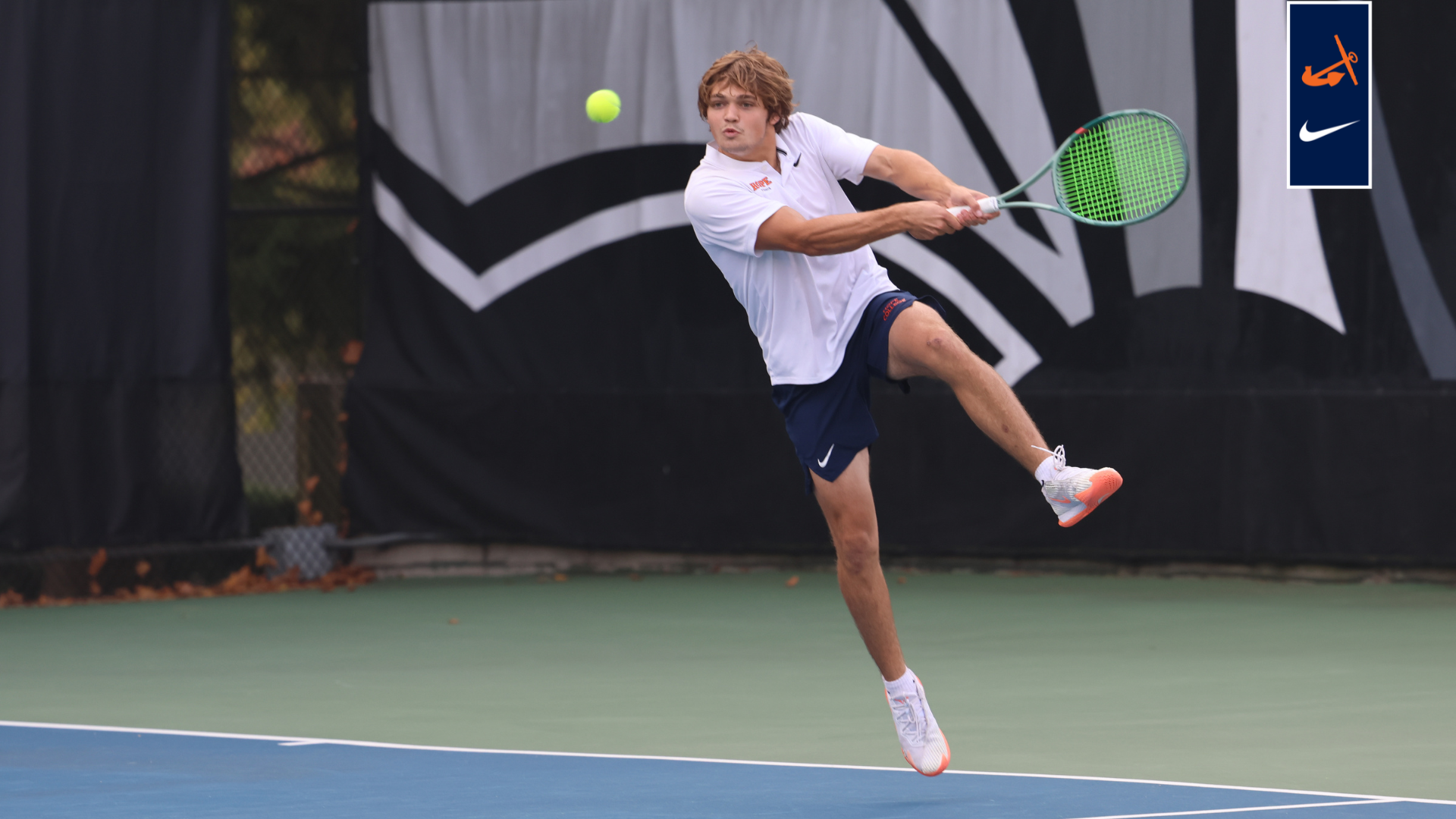 Alec Maynard returns a serve.