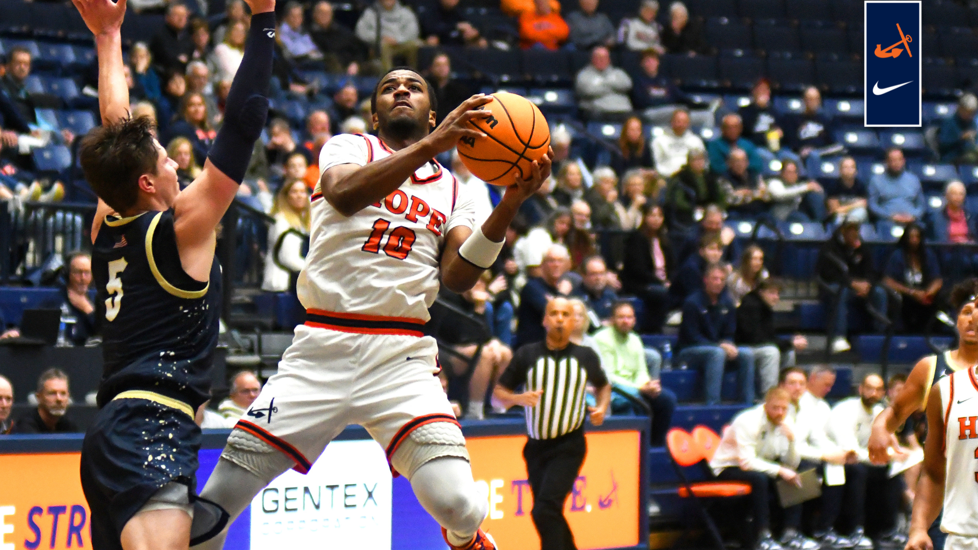 Justice Mims goes up for a layup