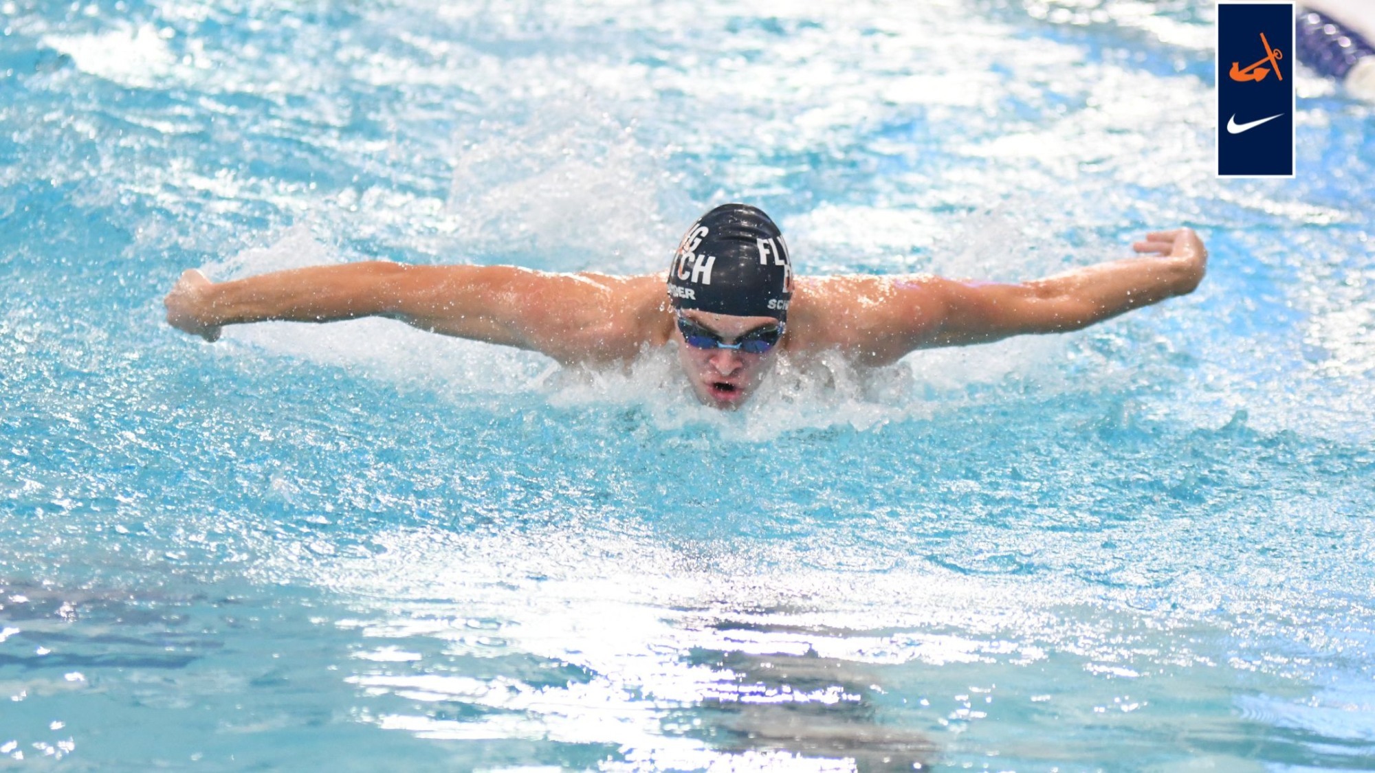 Nolan Schneider swims the butterfly.