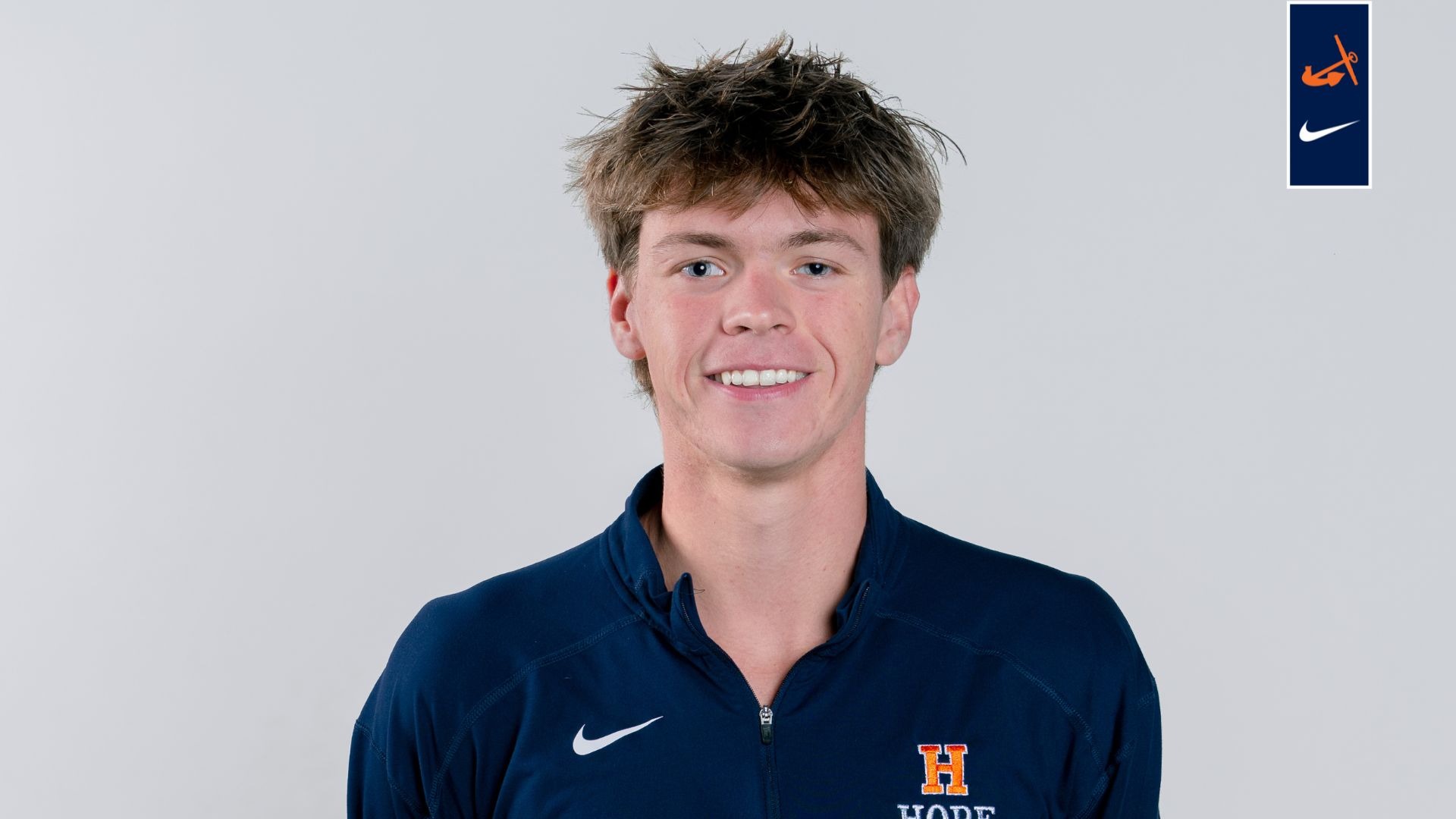 Runner Elijah Forbord poses for a portrait.