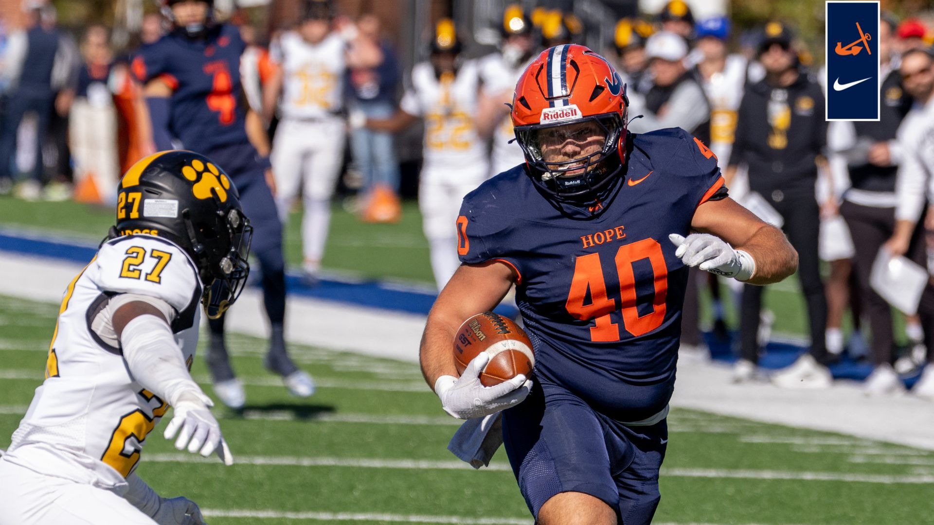 Tight end Seth Luhmann runs for a gain after a reception vs. Adrian.