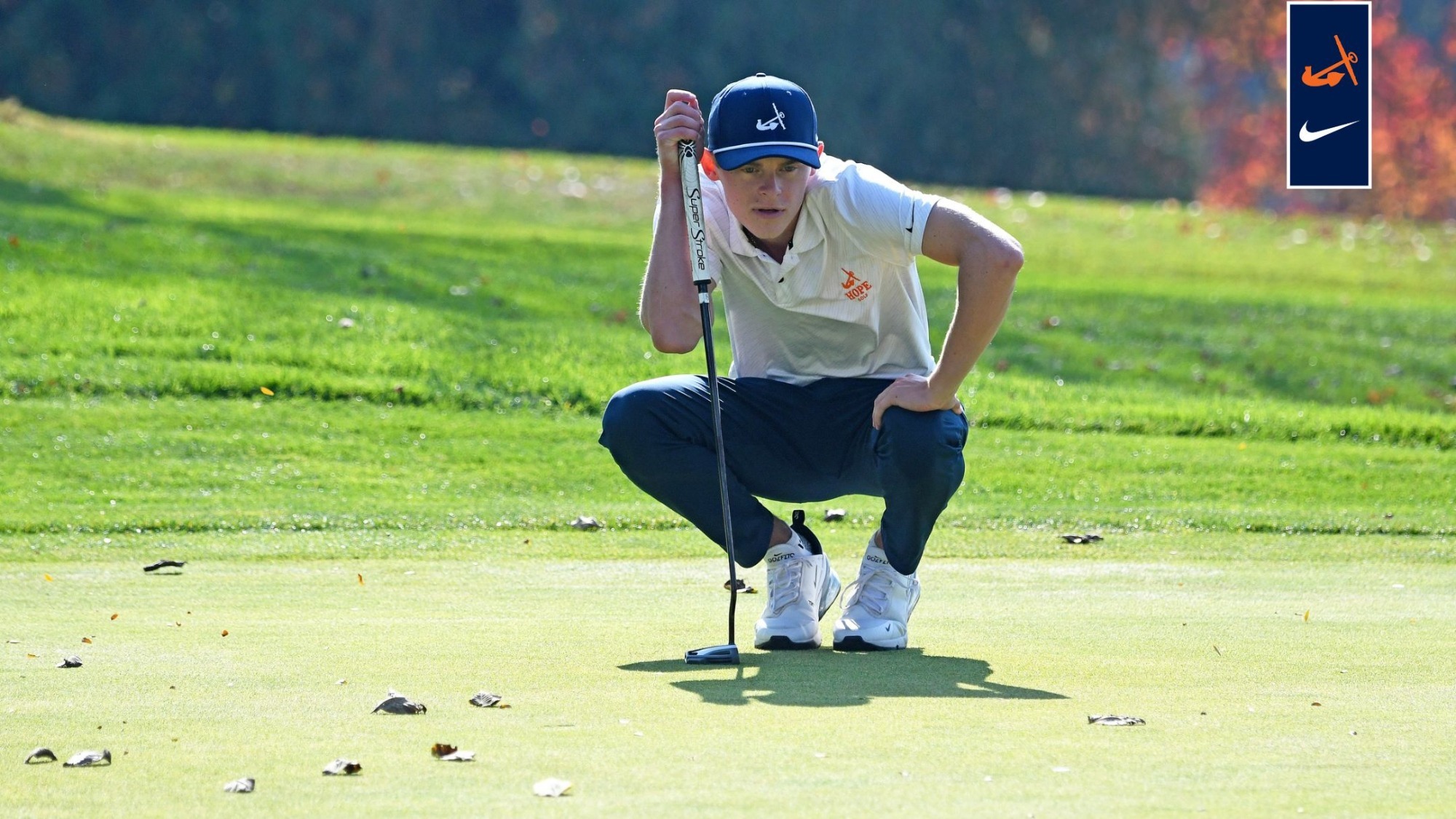 Kody Vis lines up a putt during the MIAA Men's Golf Jamboree at Gull Lake Country Club.