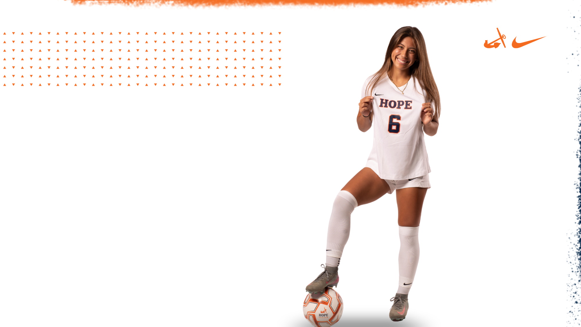 Jessica Reyes stands with a soccer ball.