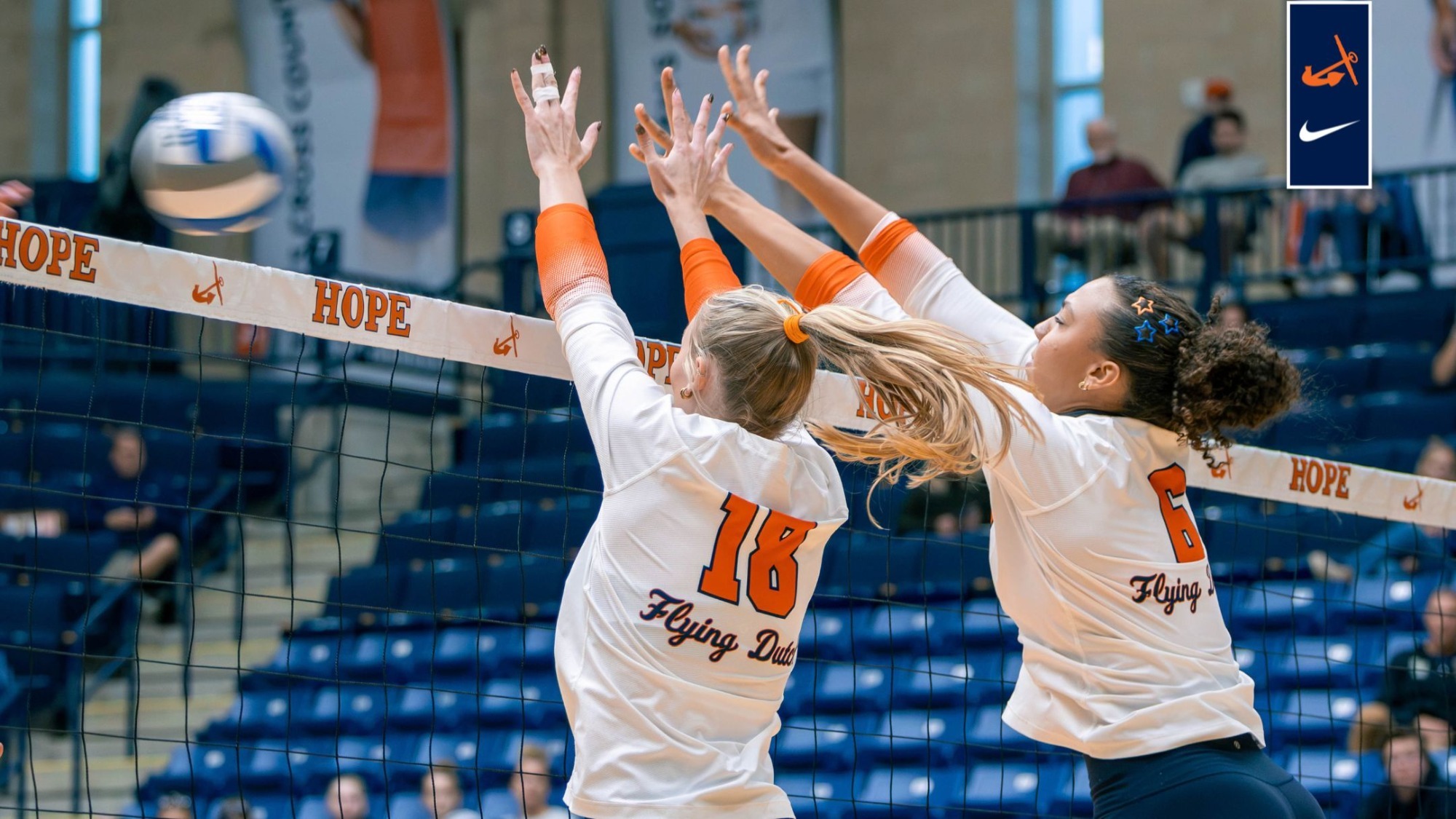 Kiera Morrison Kamryn Burbridge block a shot vs. Adrian