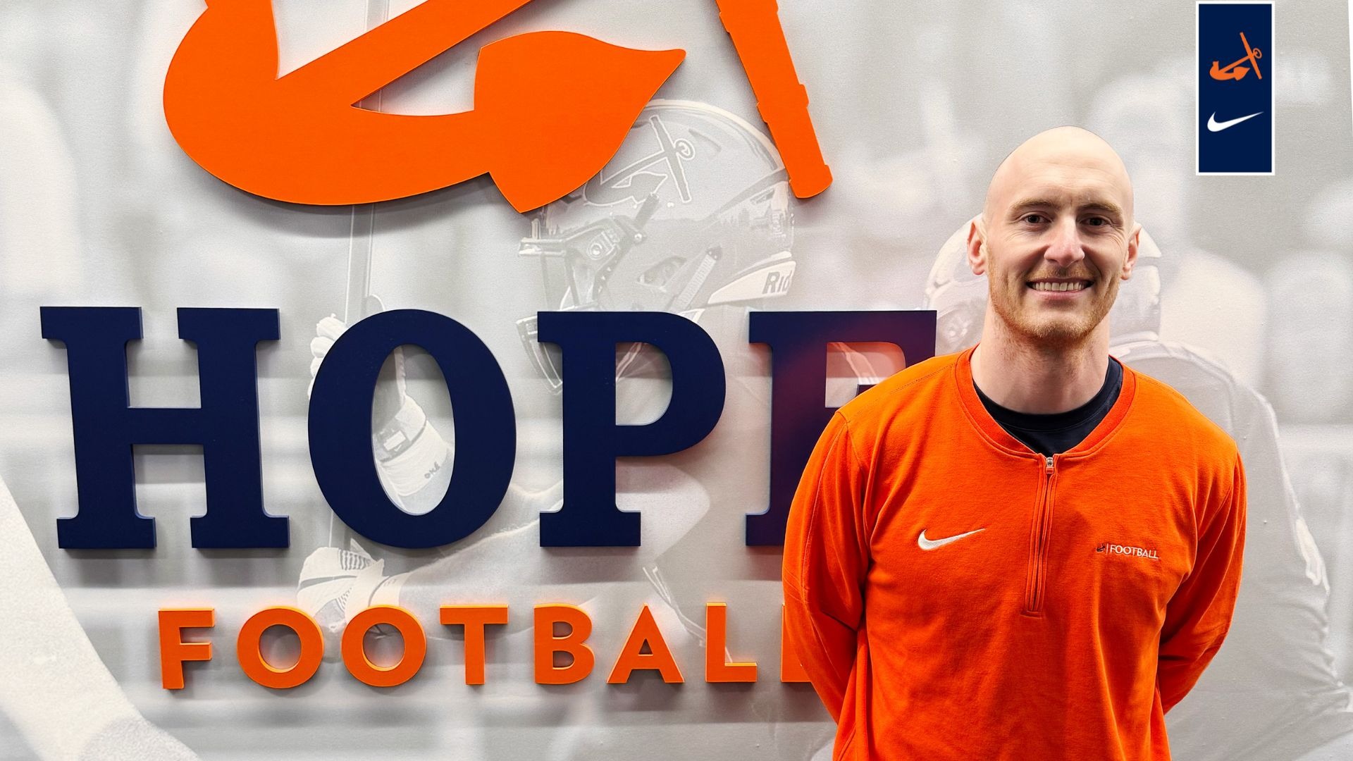 Alex Smith poses for a photo 