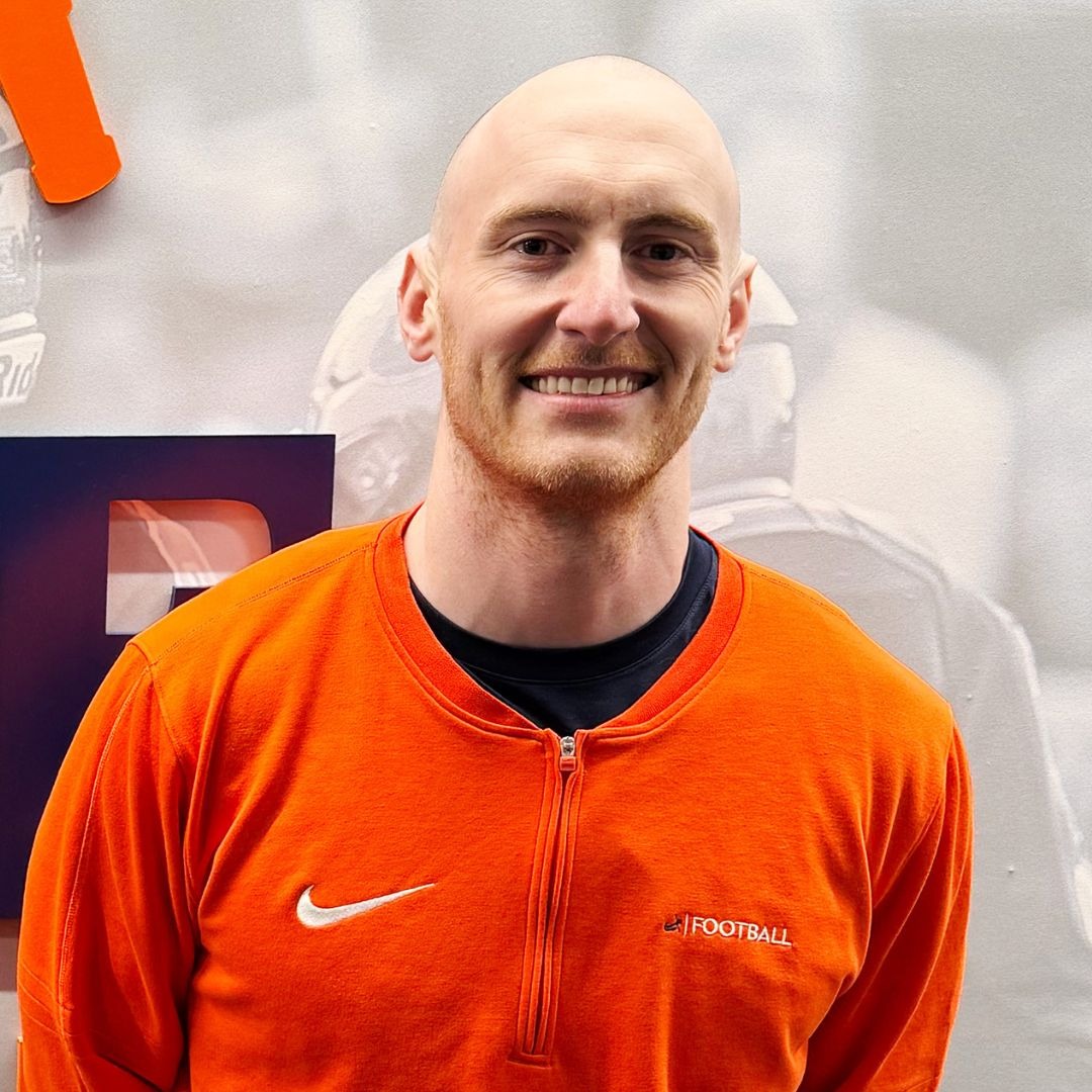 Alex Smith poses for a portrait.