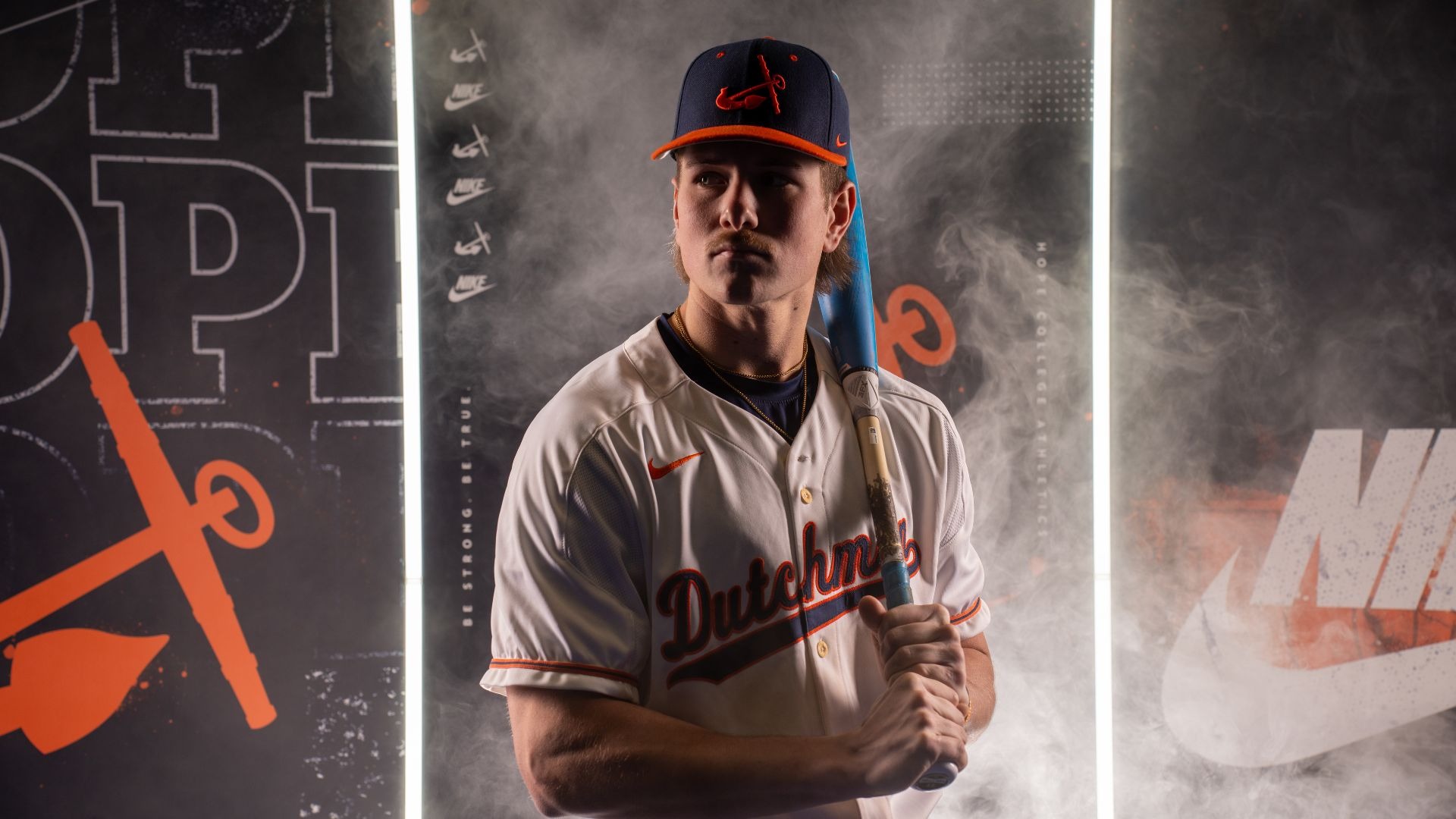 Cade Seabaugh holds a baseball bat.