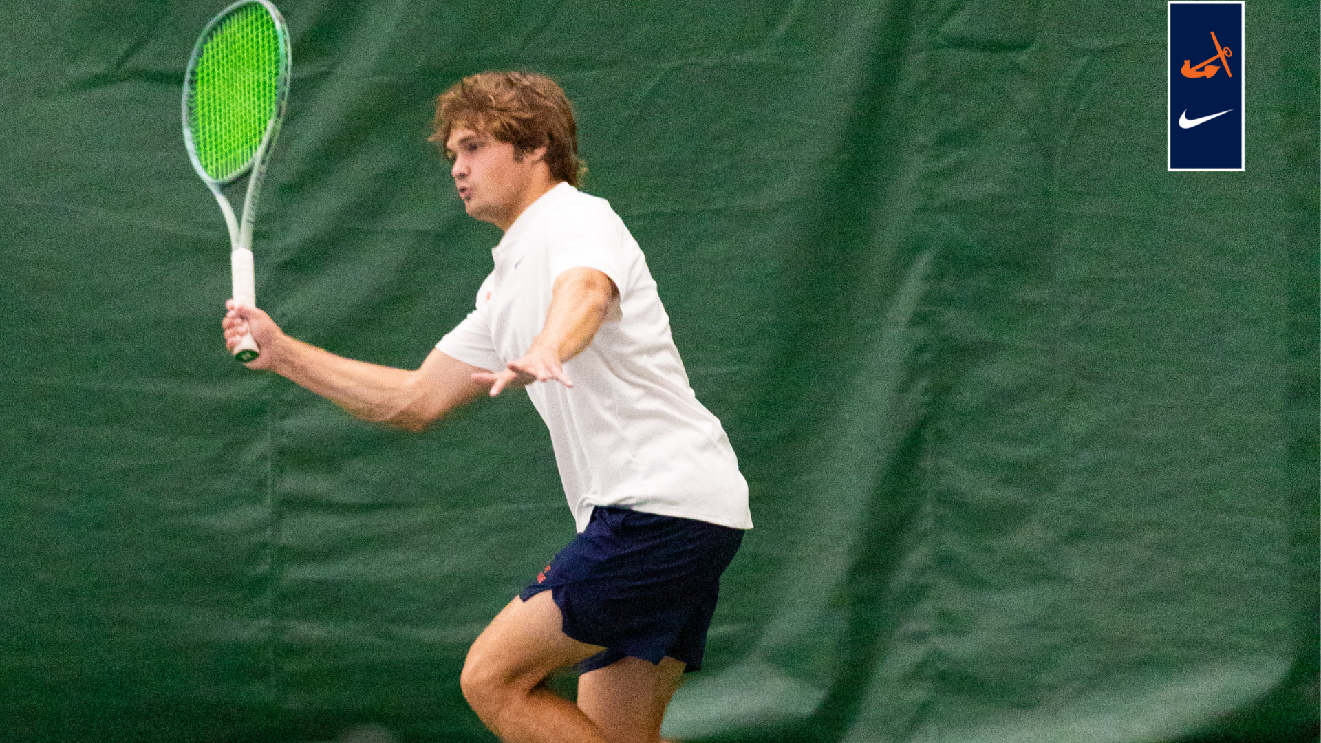 Alec Maynard returns the ball
