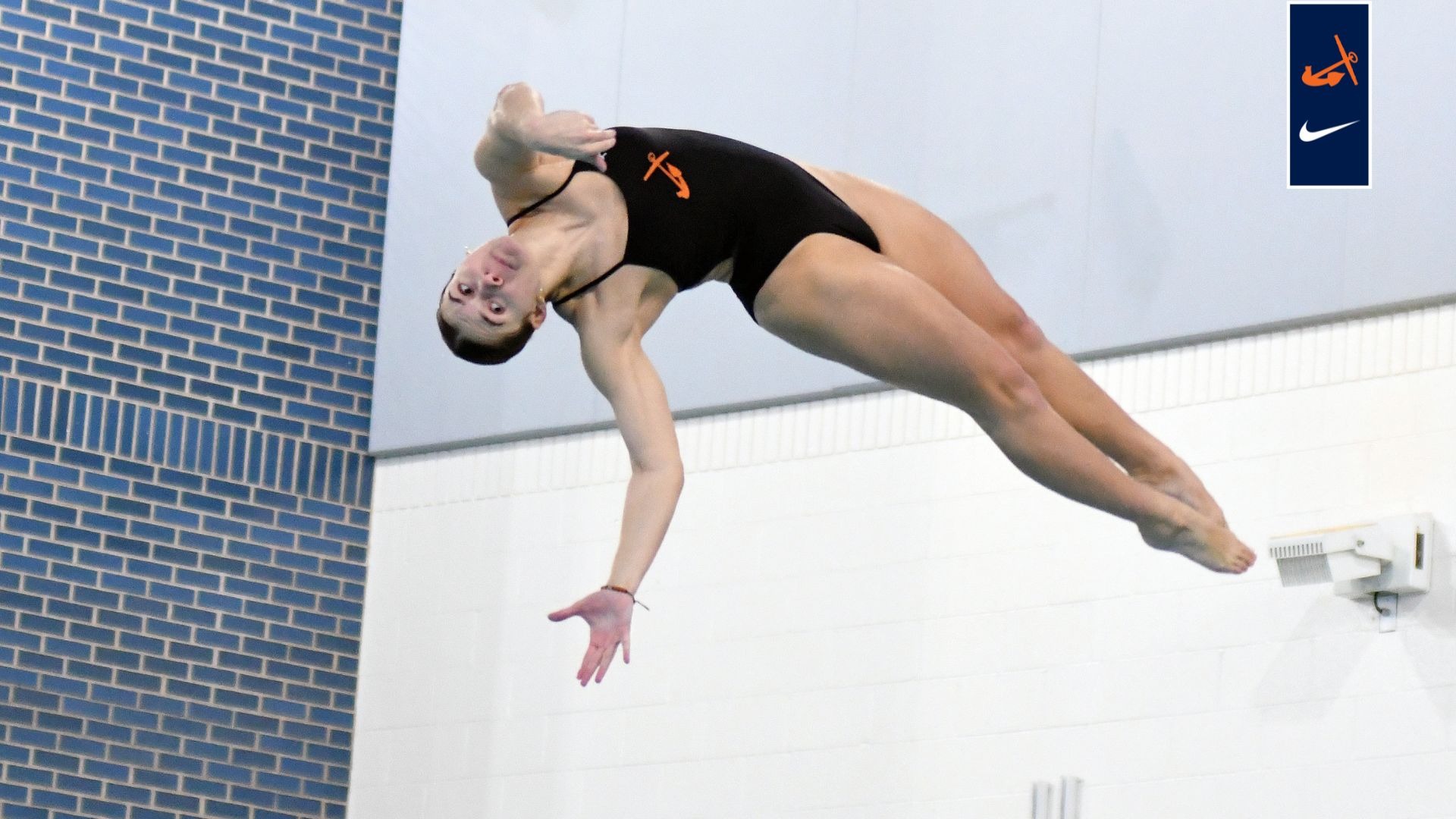 Grace Dawson dives into the water.