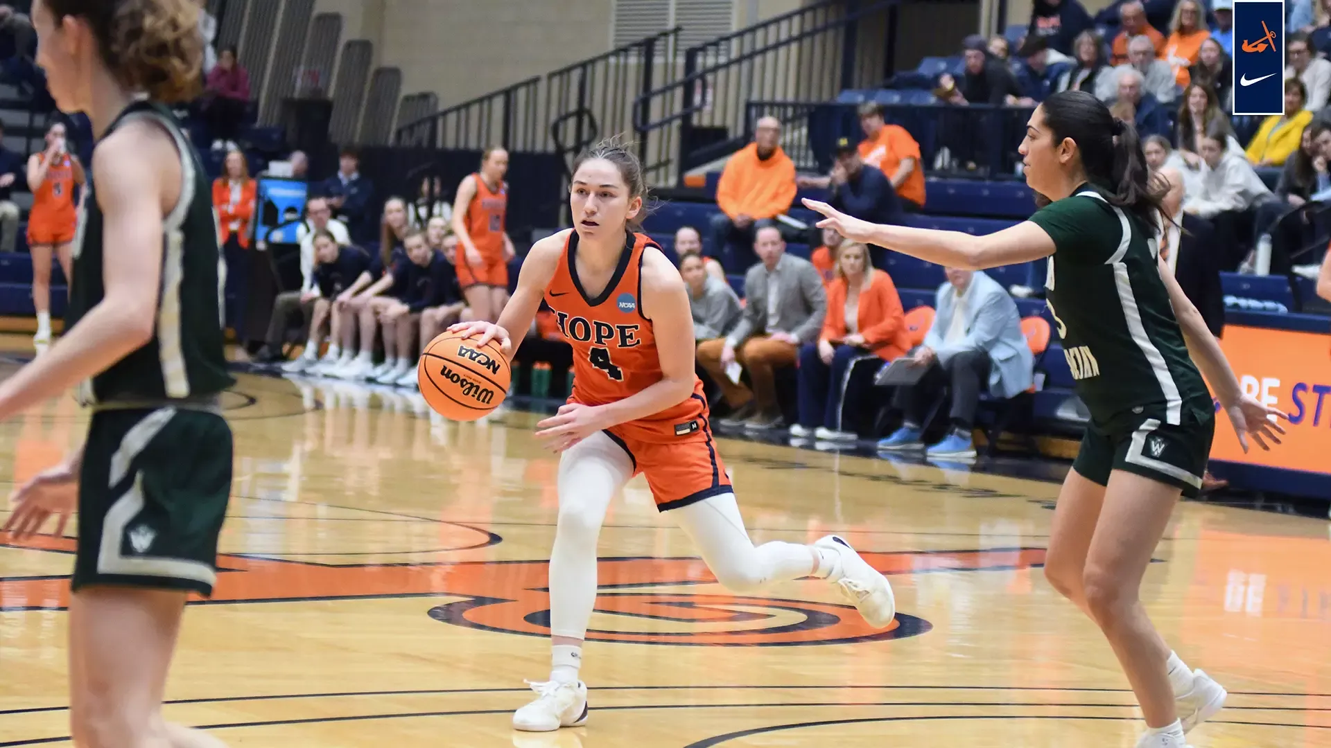 Lauren Leach dribbling.