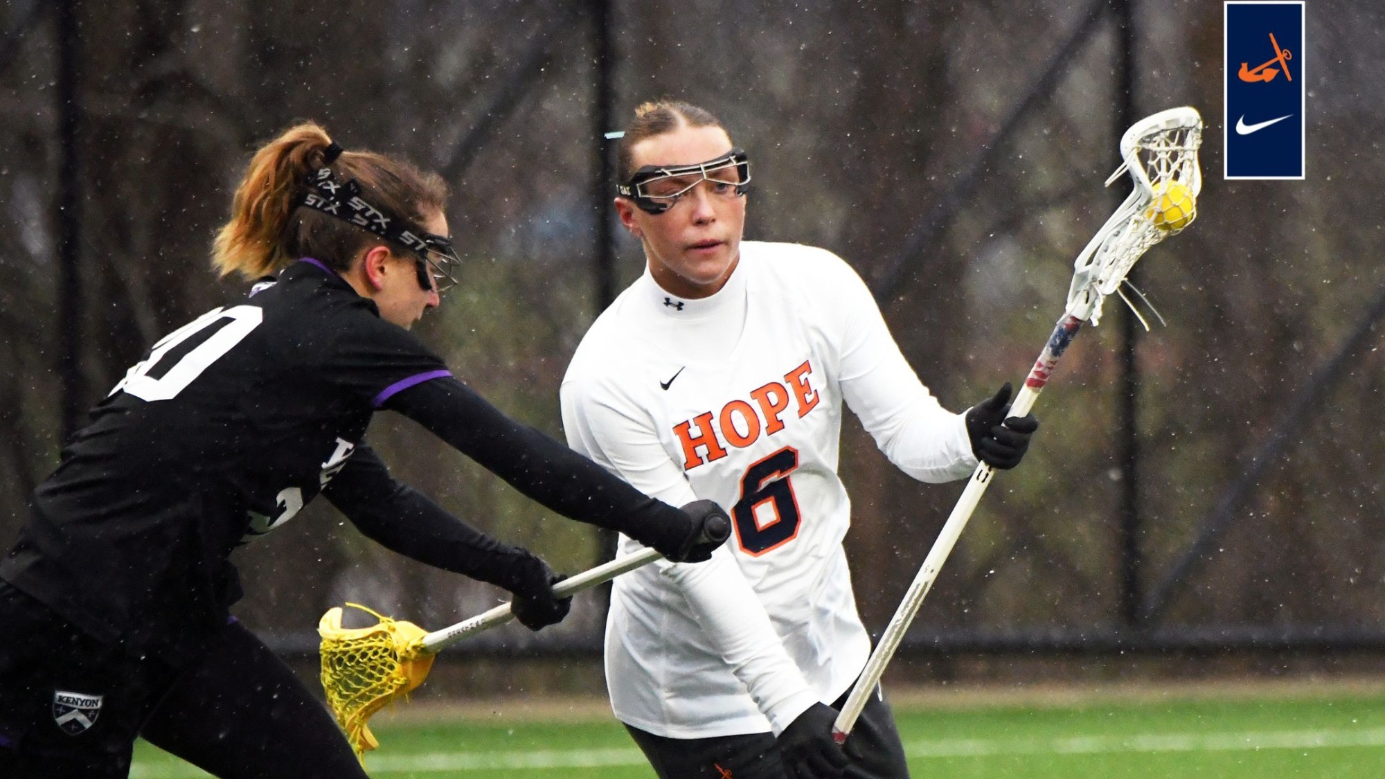 Elliana Hillard charges ahead with the lacrosse ball vs. Kenyon.