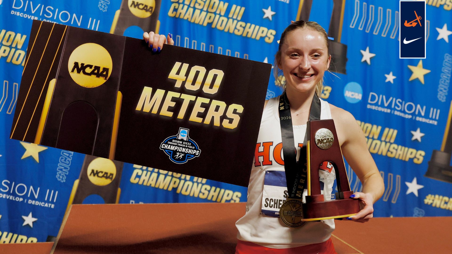 Sara Schermerhorn holds her national championship trophy.