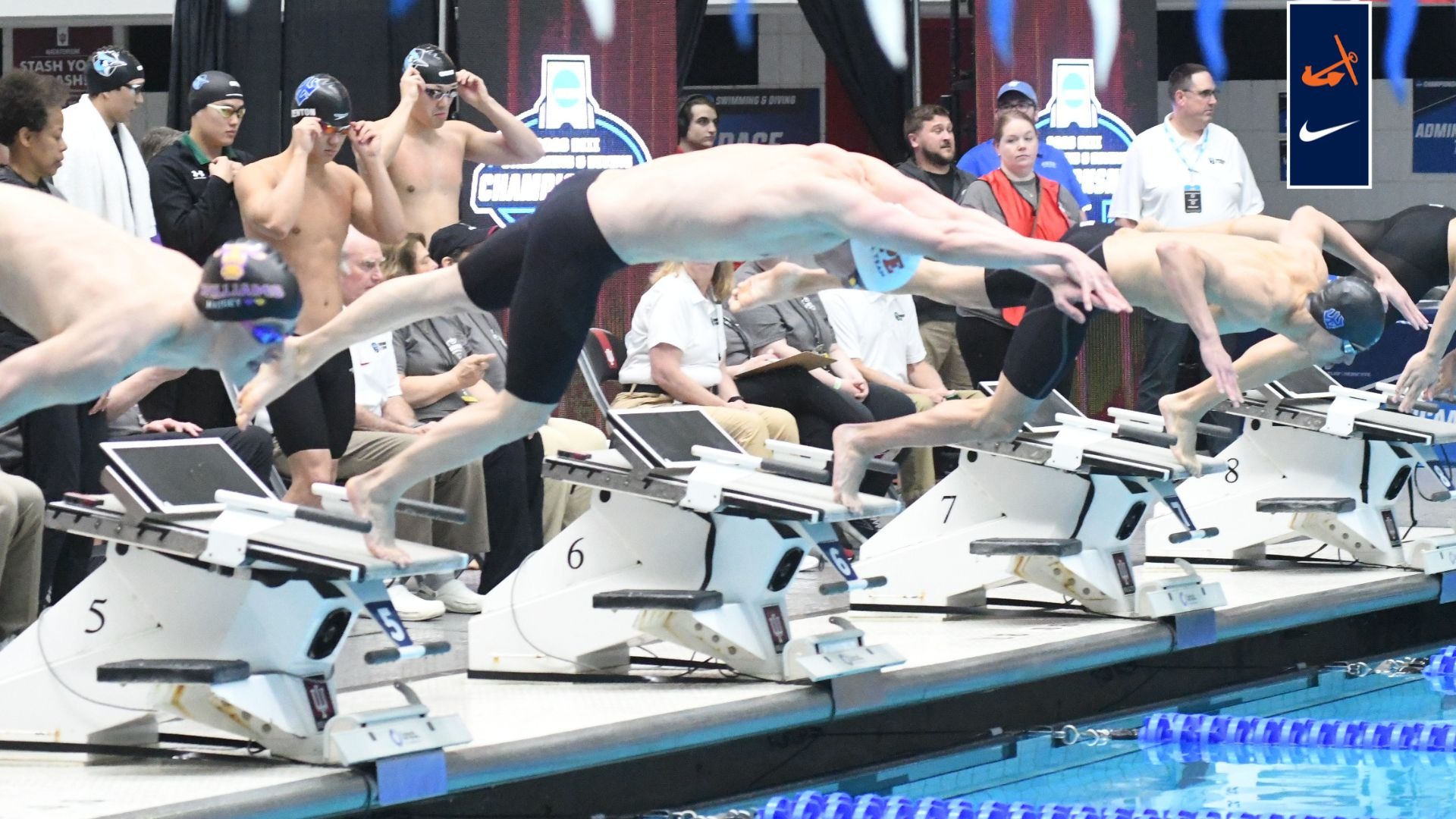 Swimmer Graham Eisenmann leaps off the starting block.