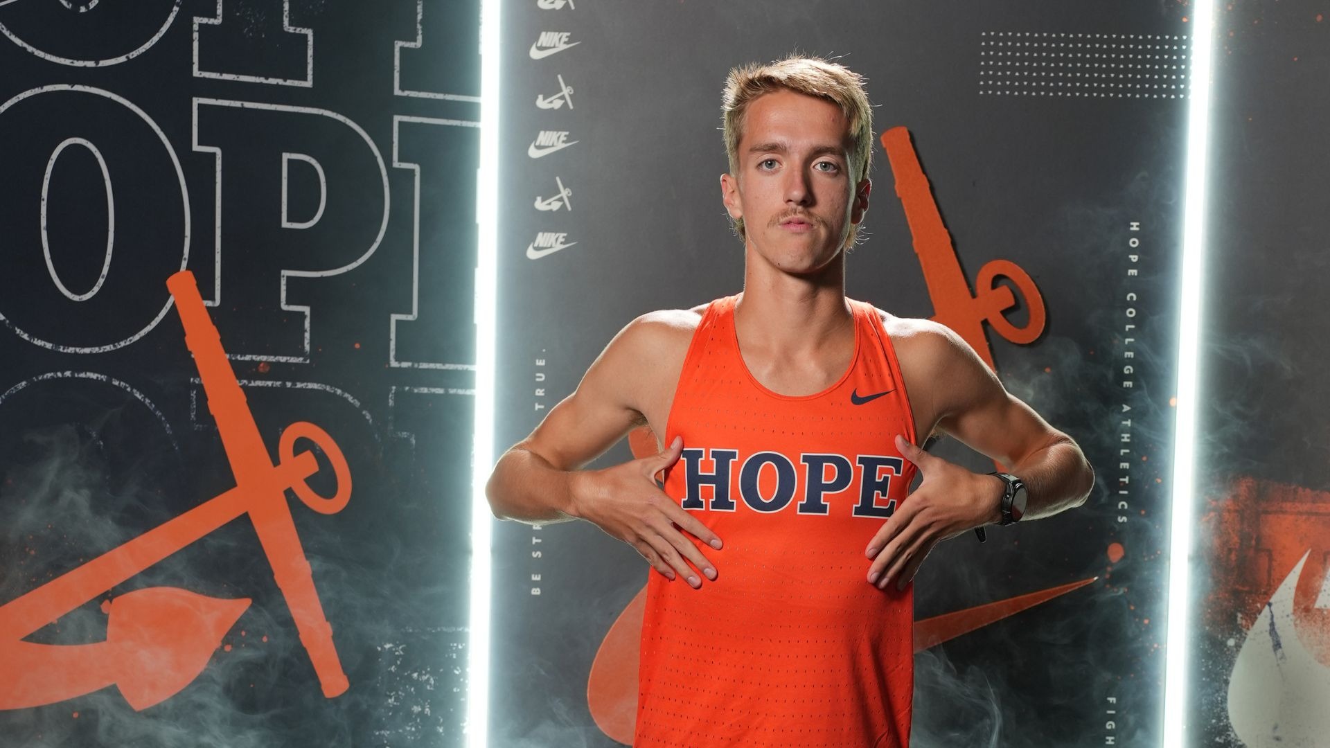 Runner Noah Norris poses for a portrait.