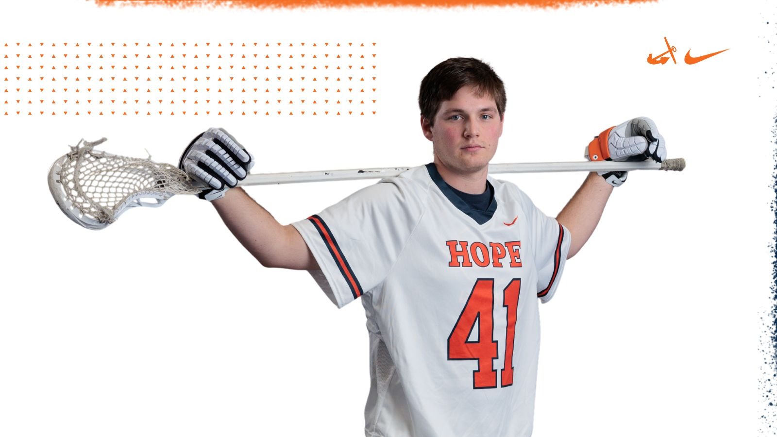 Lance Hart holds a lacrosse stick on his shoulders.