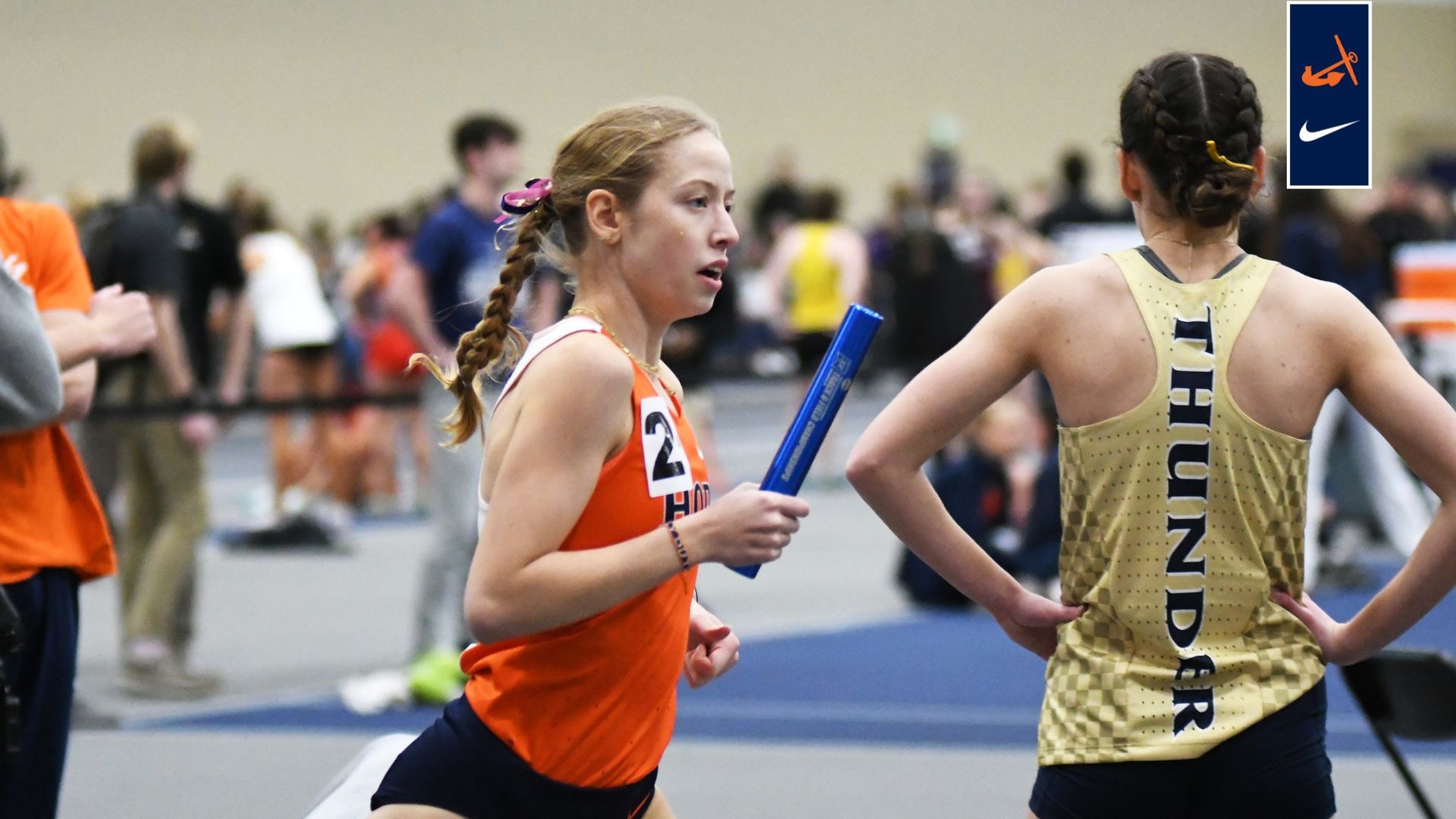 Runner Mary England races during the MIAA Championships