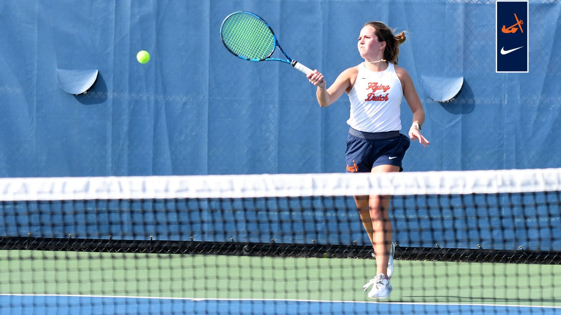 Mallory Matthews hits a forehand return vs. Alma.