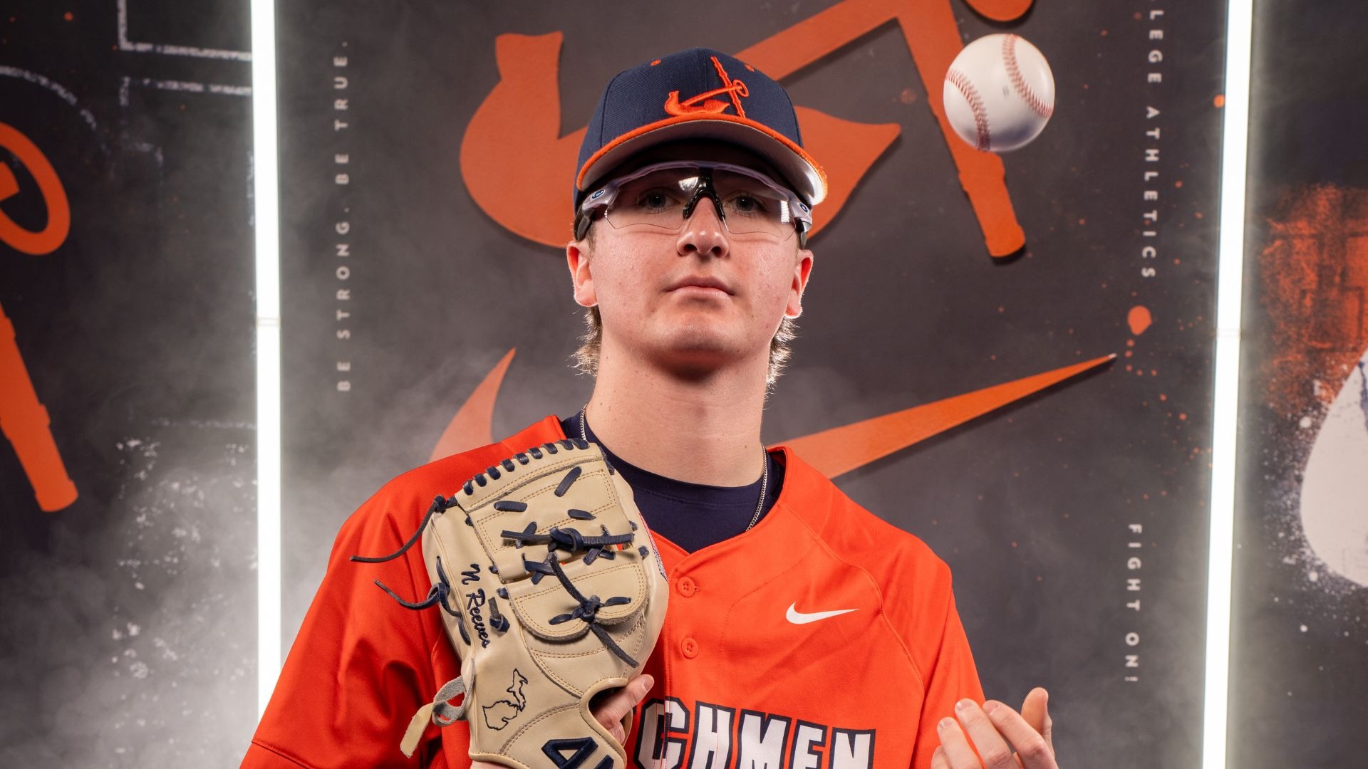 Noah Reeves flips the baseball in the air.