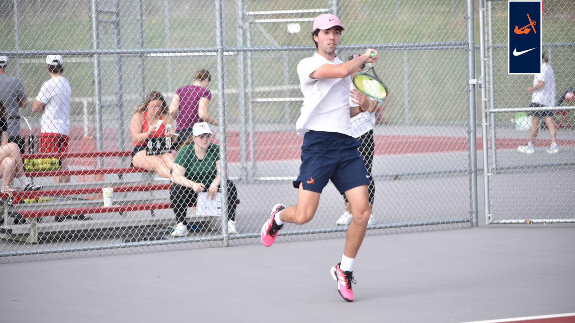Ned Curley returns a shot