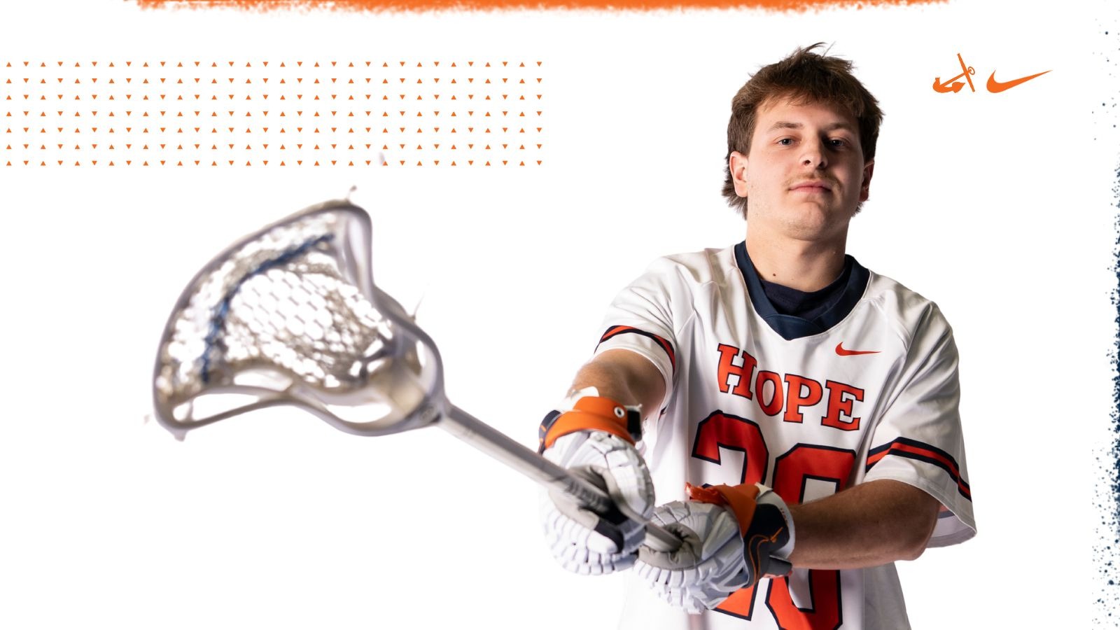 Preston Hoexum holds a lacrosse stick.