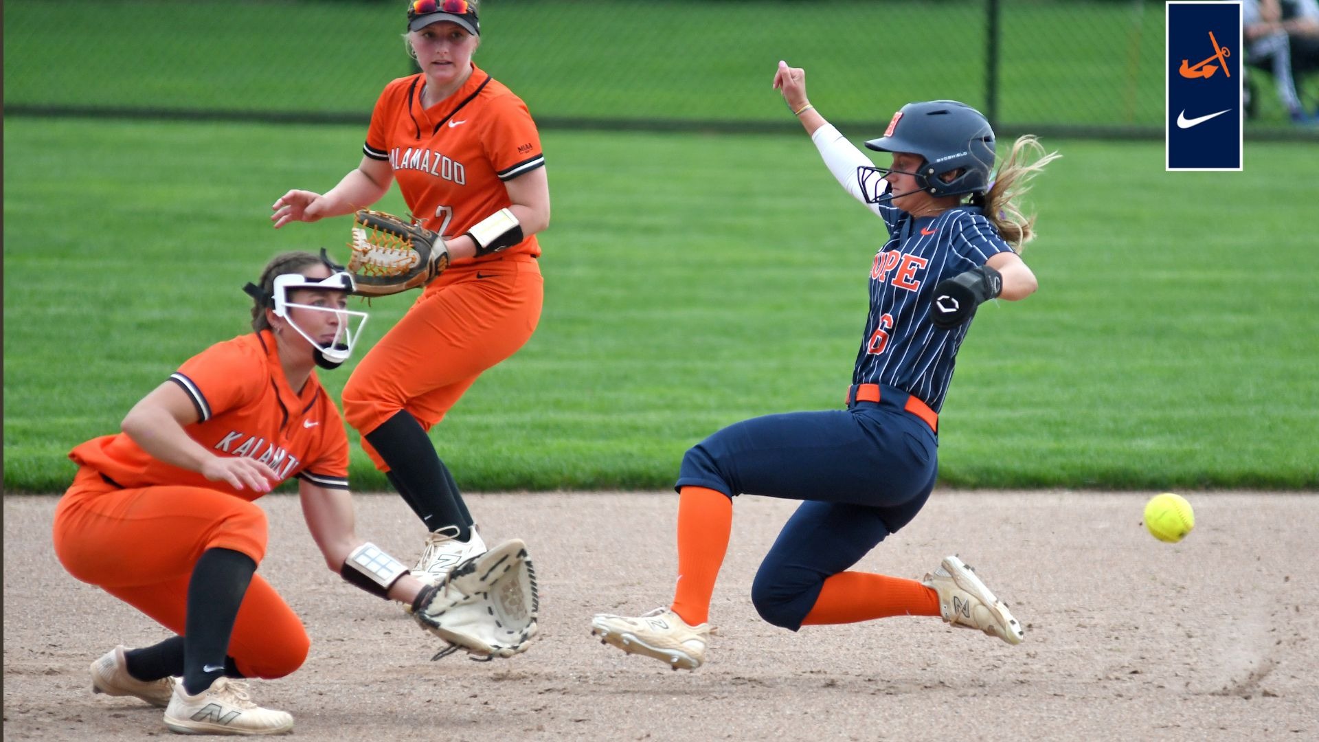 Emily Brown slides into second base vs. Kalamazoo ahead of the throw.