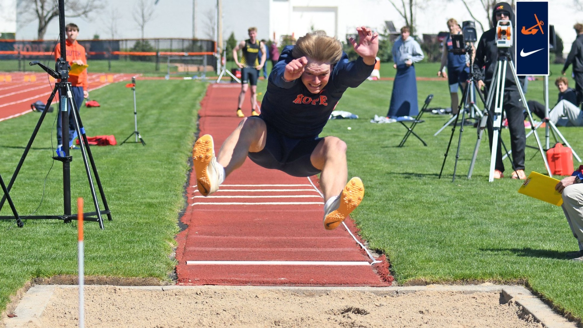 Lincoln Phillips leaps in the high jump during the decathlon at the MIAA Outdoor Track and Field Championships at Brewer Track.