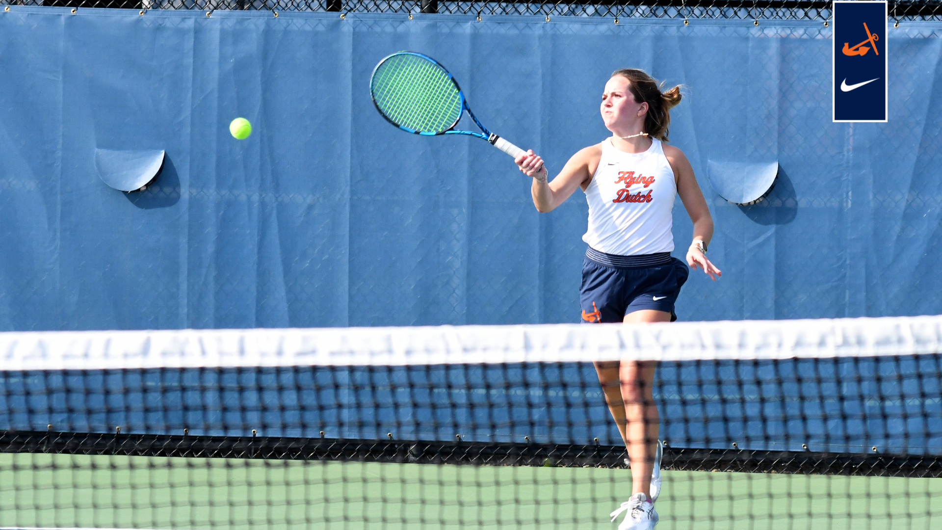 Mallory Matthews returns a serve