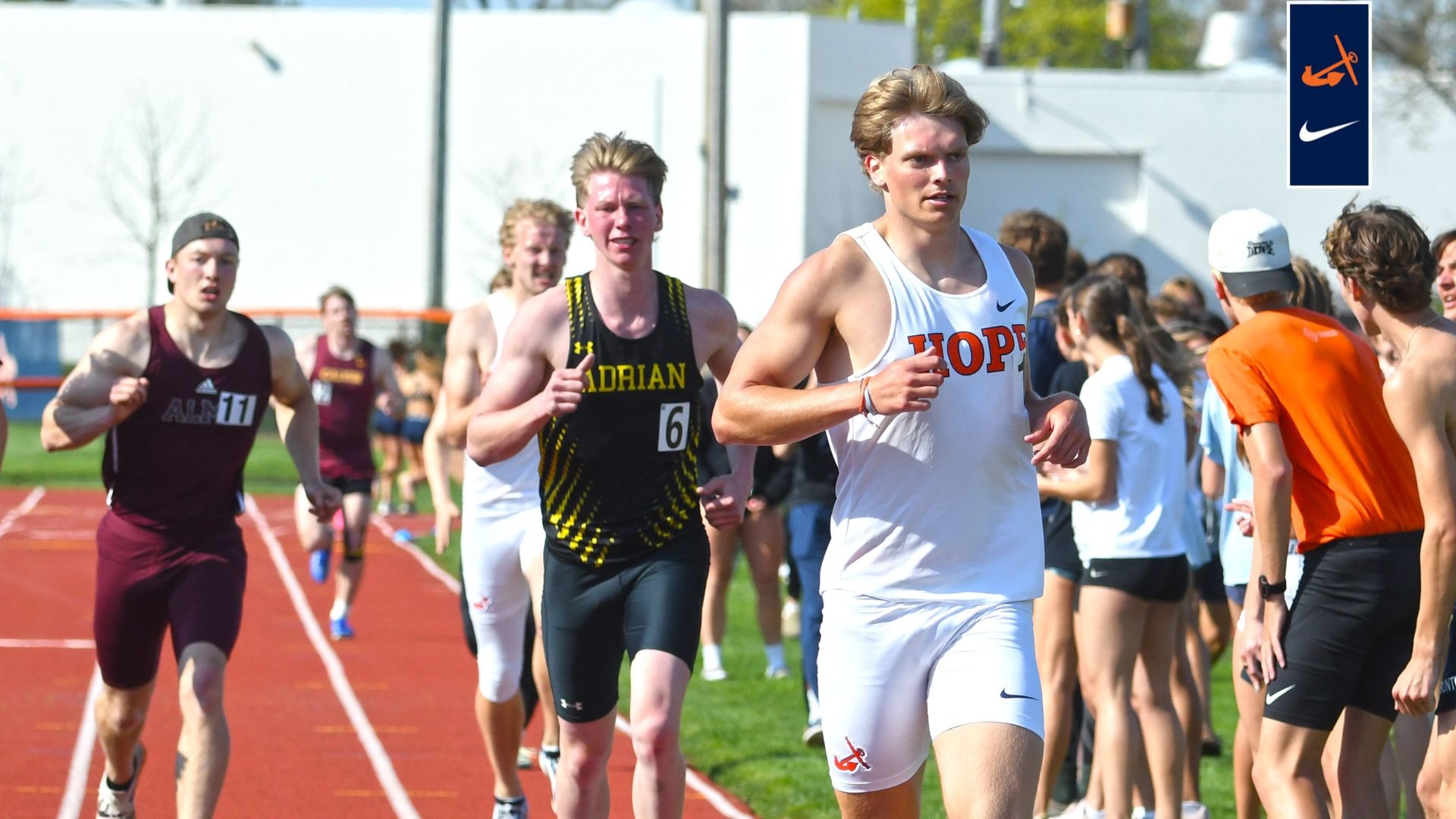 Runner  Lincoln Phillips crosses the finish line.