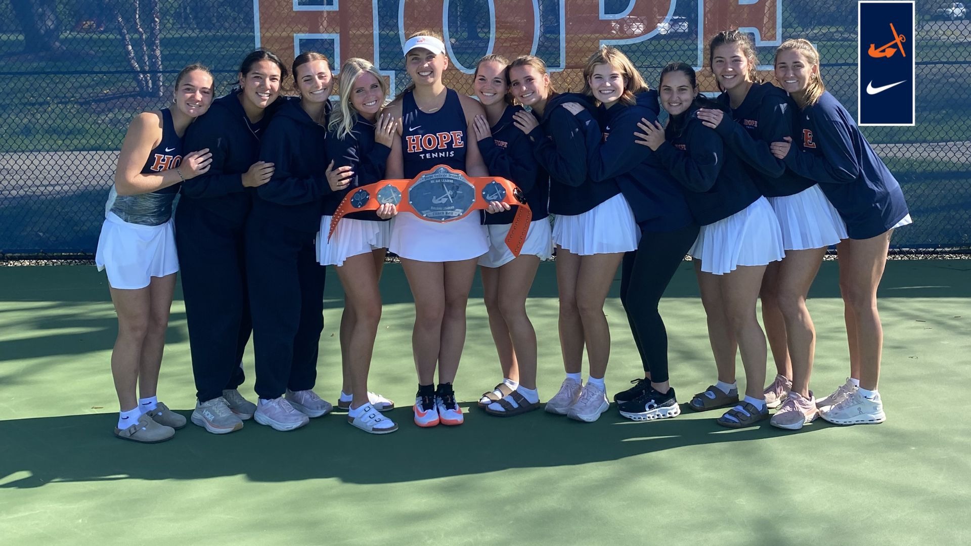 The Hope College women's tennis team celebrate MIAA title-clinching win vs. Saint Mary's.