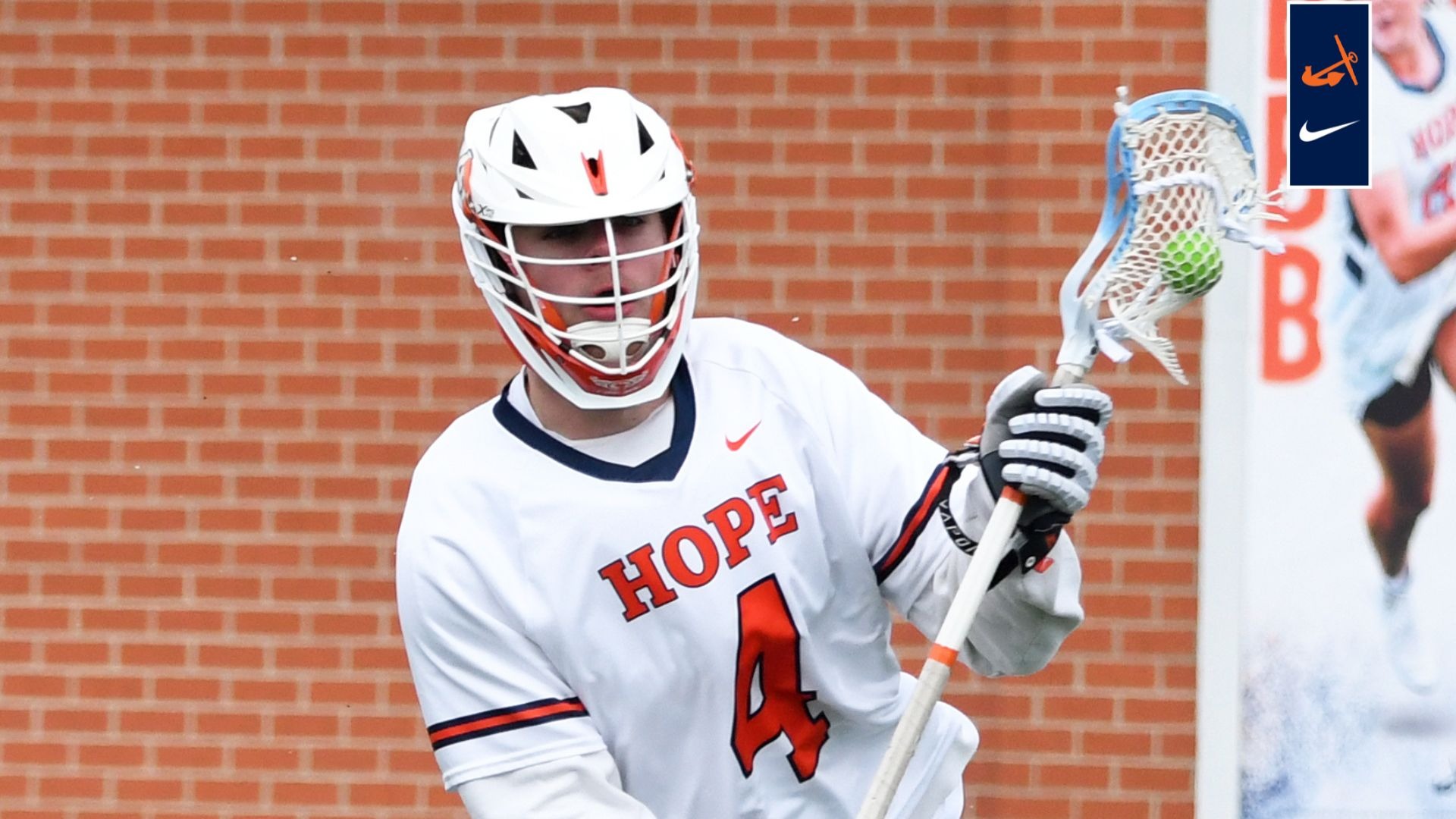 Andon Rieger runs up field with the lacrosse ball against Edgewood.