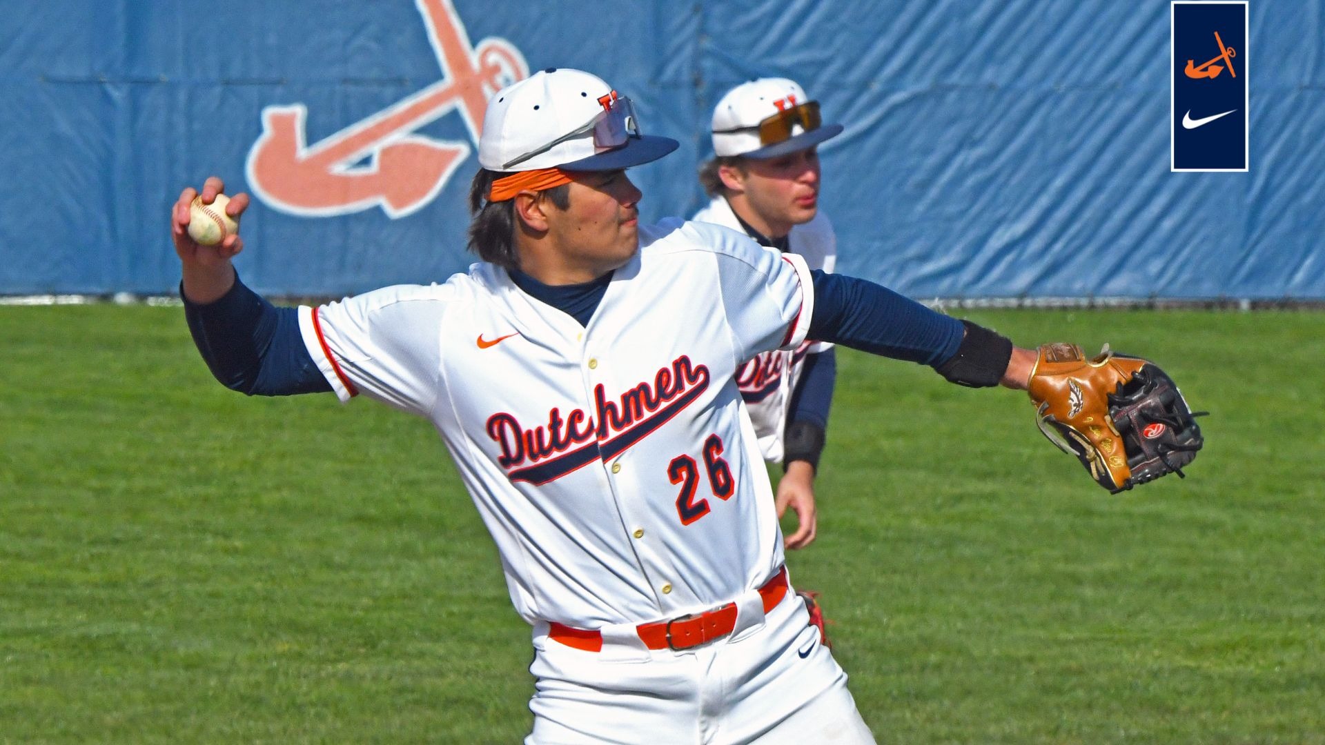 Colton Kinnie throws the baseball from third to first.