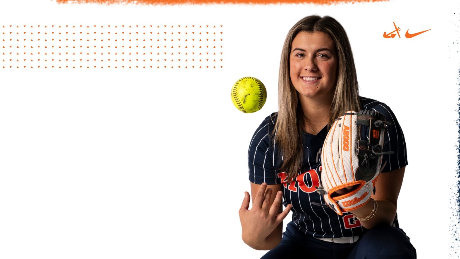 Becca Tuttle flips a softball in the air.