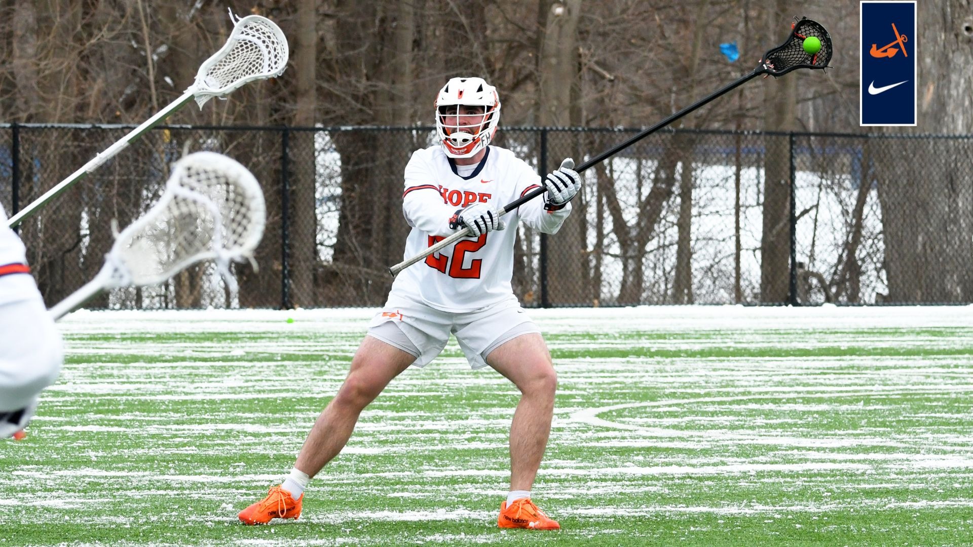 Long-stick midfield John Foster throws the ball up field.