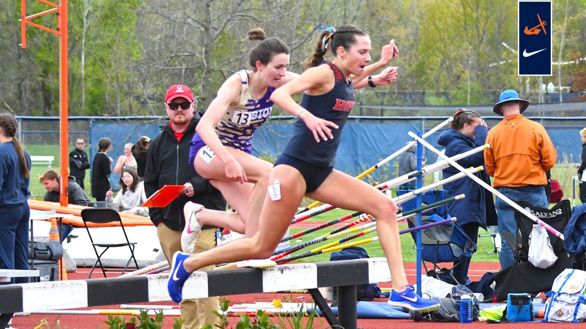 Molly Durow clears a steeplechase hurdle