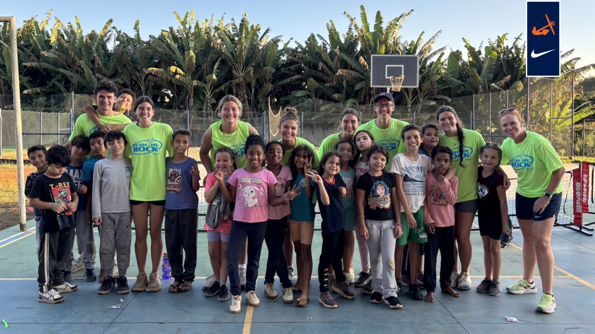 Hope SEED group poses for a photo with children in Brazil.