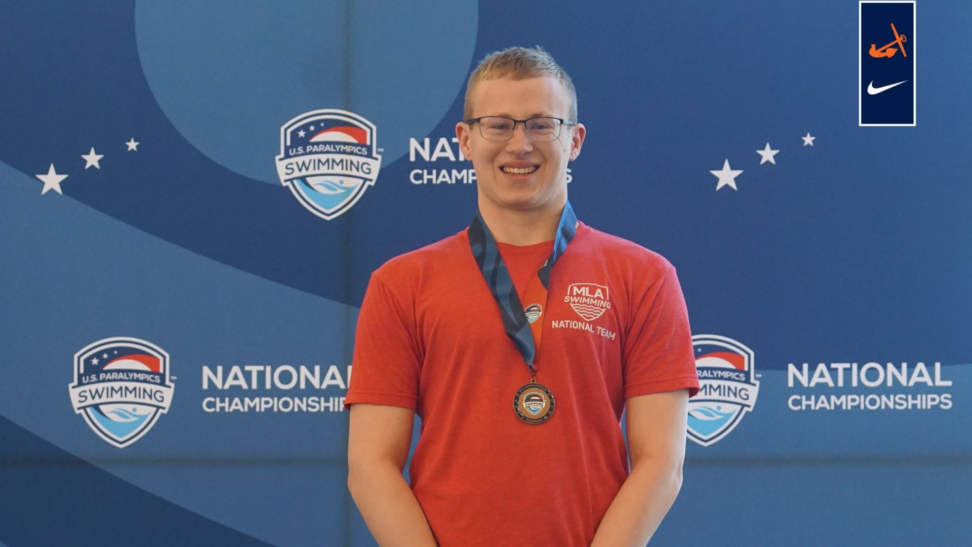 Swimmer Aaron Thomas poses for a portrait.
